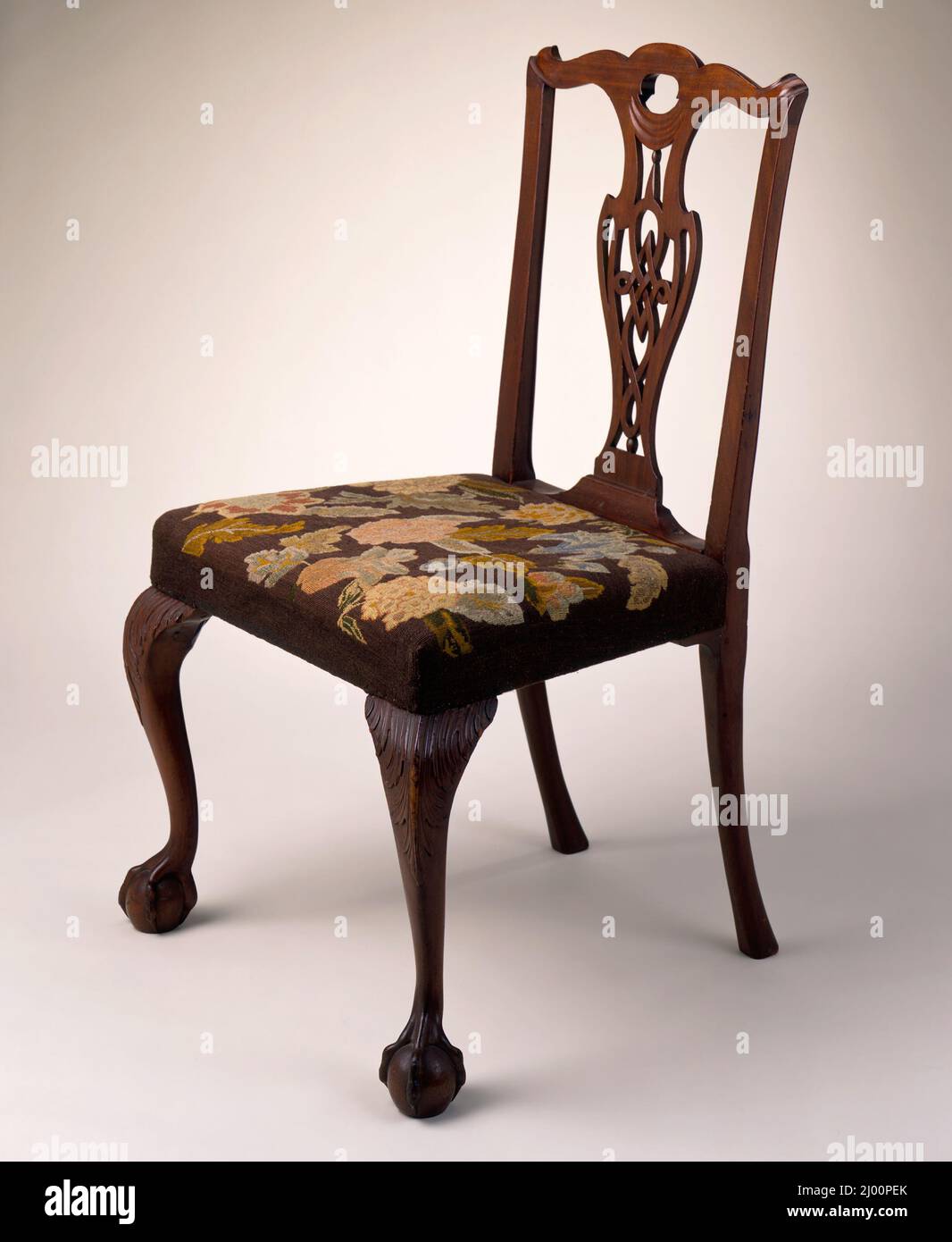 Side Chair with Diamond and Figure-eight Splat. United States, Massachusetts, Boston-Salem area, 1765-1775. Furnishings; Furniture. Mahogany, maple, needlepoint [not original] Stock Photo