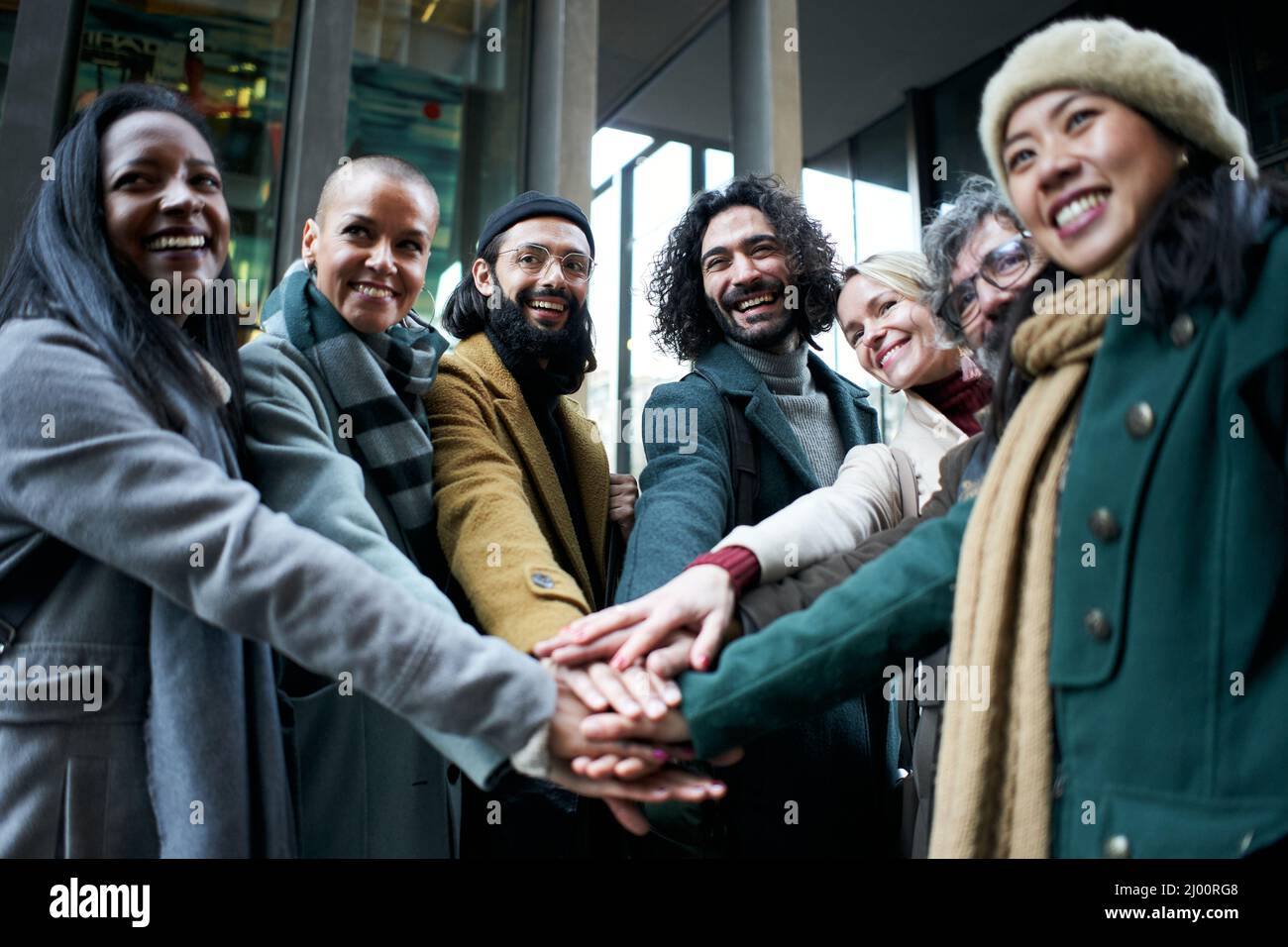 Group of business people outdoors joying hands celebrating success at ...