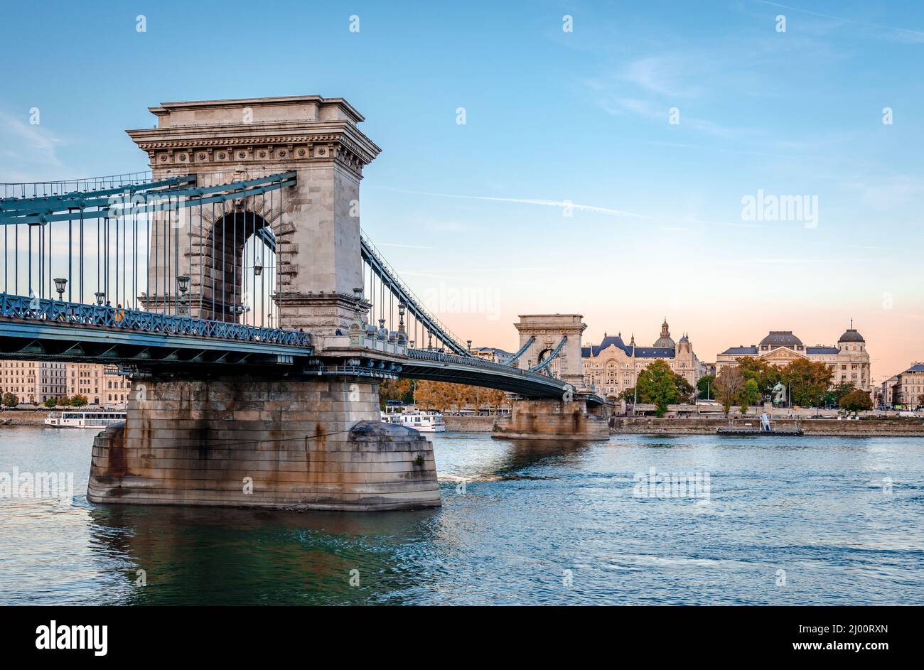 Budapest, Hungary - October 4 2018: Sunset with the Chain Bridge and with Pest, the eastern side of the city, in the background. Stock Photo