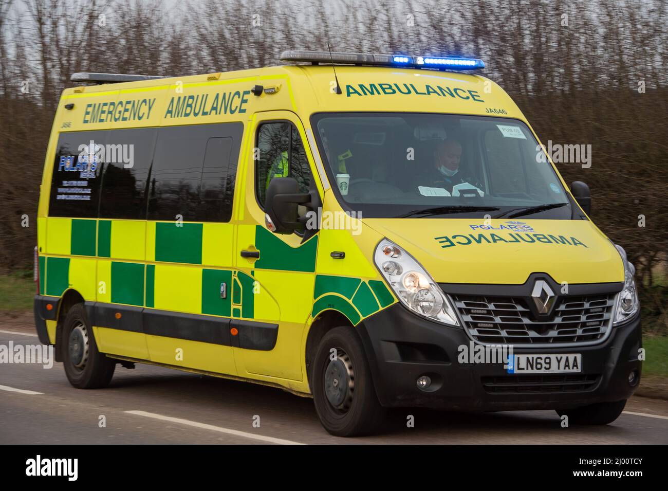 Aylesbury, Buckinghamshire, UK. An emergency ambulance from Stoke Mandeville Hospital on the A413 in Aylesbury this evening. As Covid-19 cases begin to spiral upwards once again, the number of daily cases reported today were 109,802 which is up 47,902 compared to last week. Credit: Maureen McLean/Alamy Live News Stock Photo