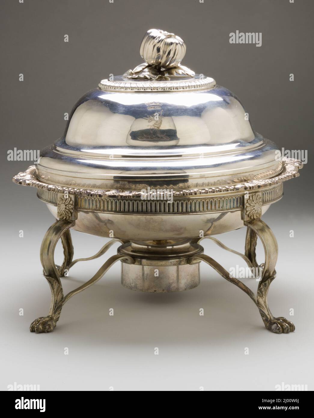 Entrée Dish with Cover and Warming Stand with Burner. Paul Storr (England, London, 1771-1844)William Bateman II (England, circa 1800-circa 1875). England, a-b) 1813; c-e) 1833. Furnishings; Serviceware. Silver Stock Photo