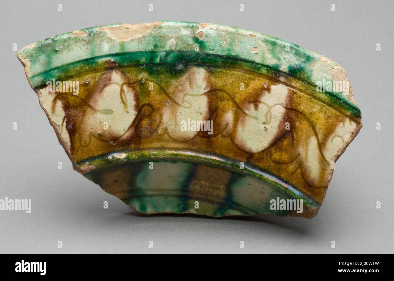 Shard: Section of Everted Rim. Egypt, Faiyum, 10th century. Ceramics. Earthenware, sgraffito splash ware Stock Photo