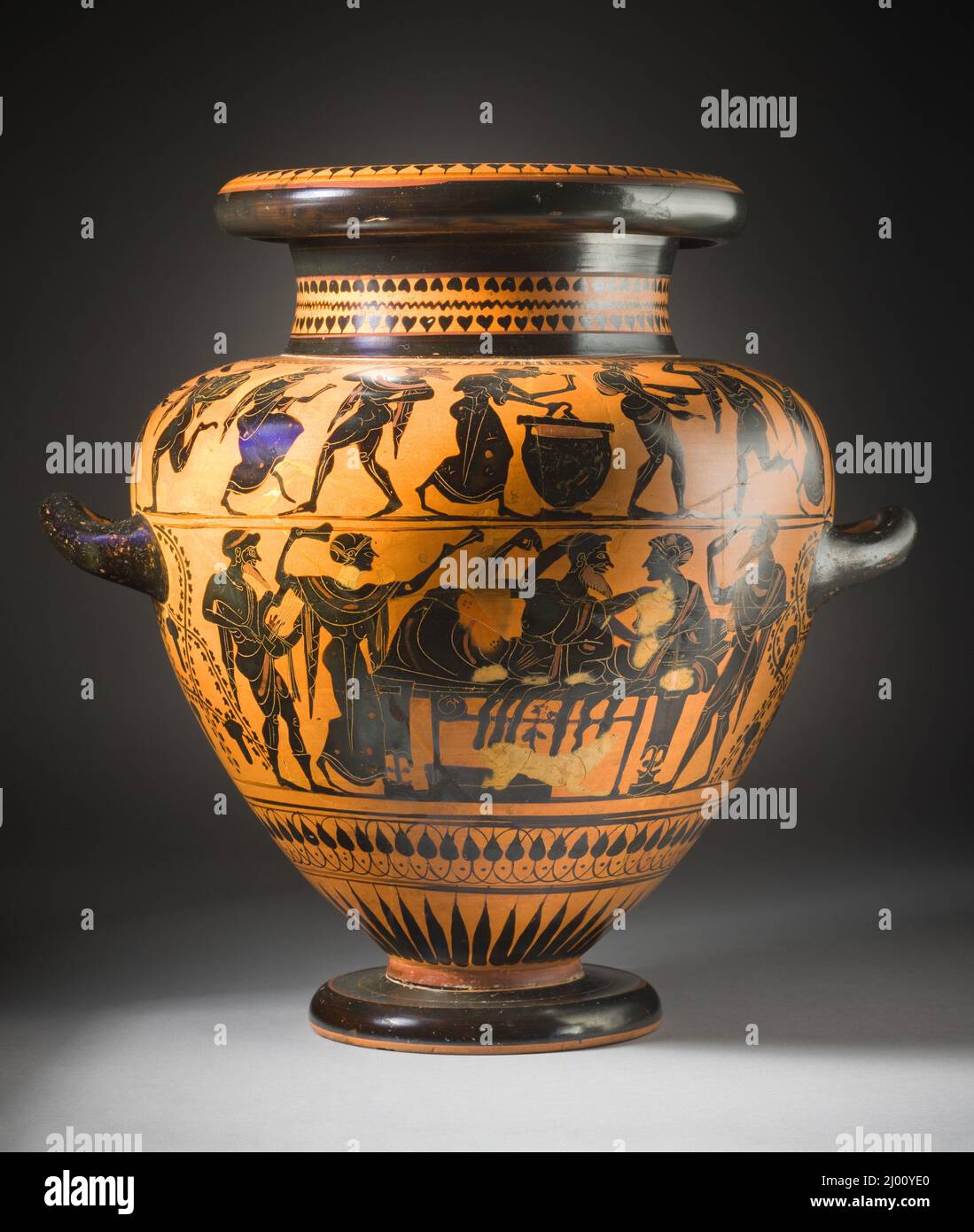 Stamnos with Reclining Banqueters and Revelers. Michigan Painter (attributed to the) (Greece, active circa 500 B.C.). Greece, Attica, circa 500 B.C.. Furnishings; Serviceware. Black-figure ceramic with added red and white Stock Photo