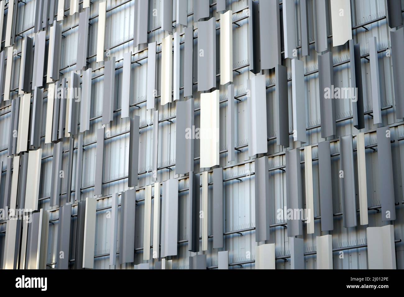 Modern grey building pattern background Stock Photo - Alamy