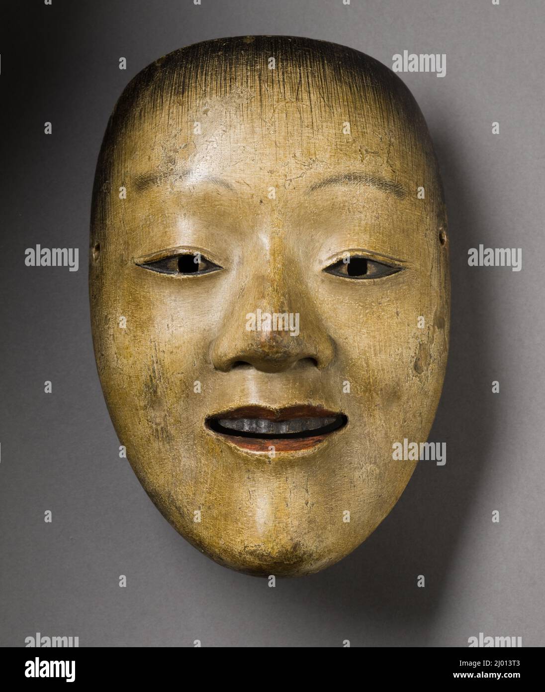 Noh Mask: Jidō (Young Male Sprite). Japan, 17th century. Jewelry and Adornments; masks. Wood and polychrome Stock Photo