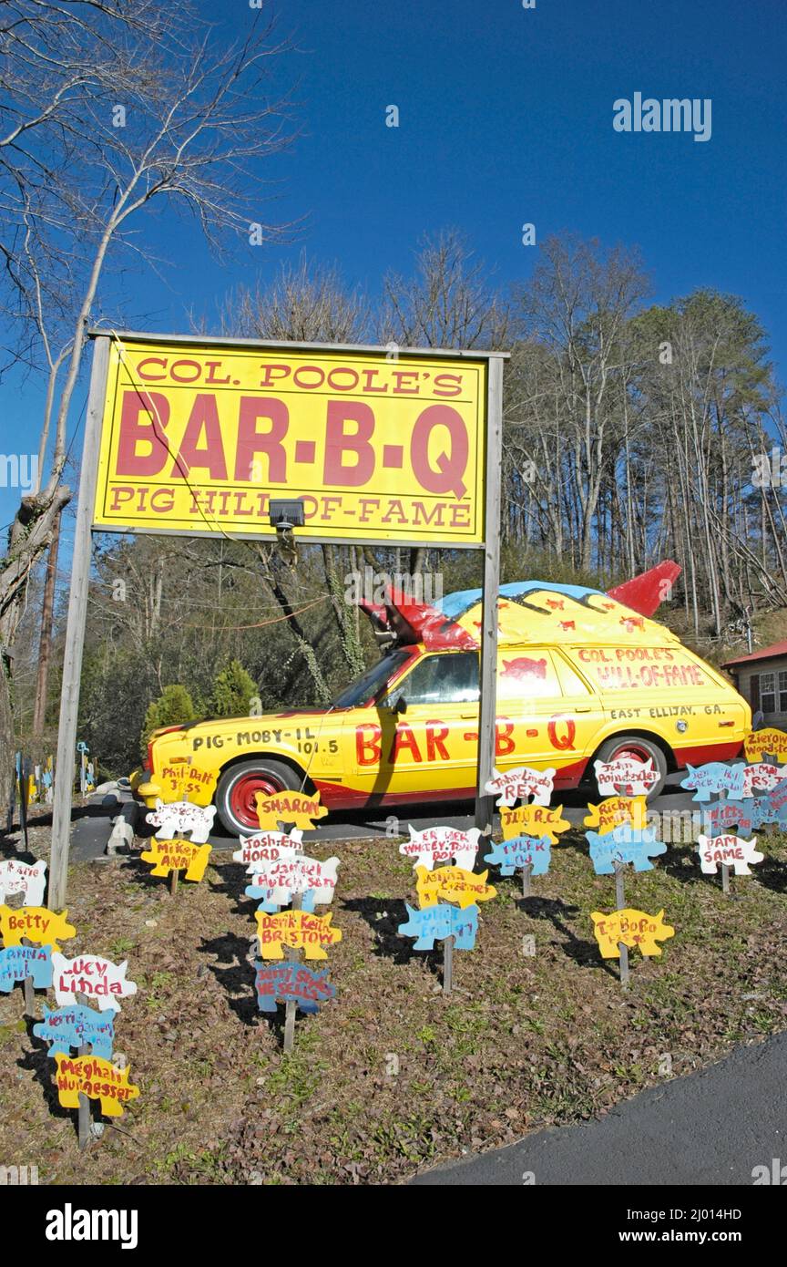 Col. Poole's Pig Hall of Fame and Pigmobile car in the hills of North
