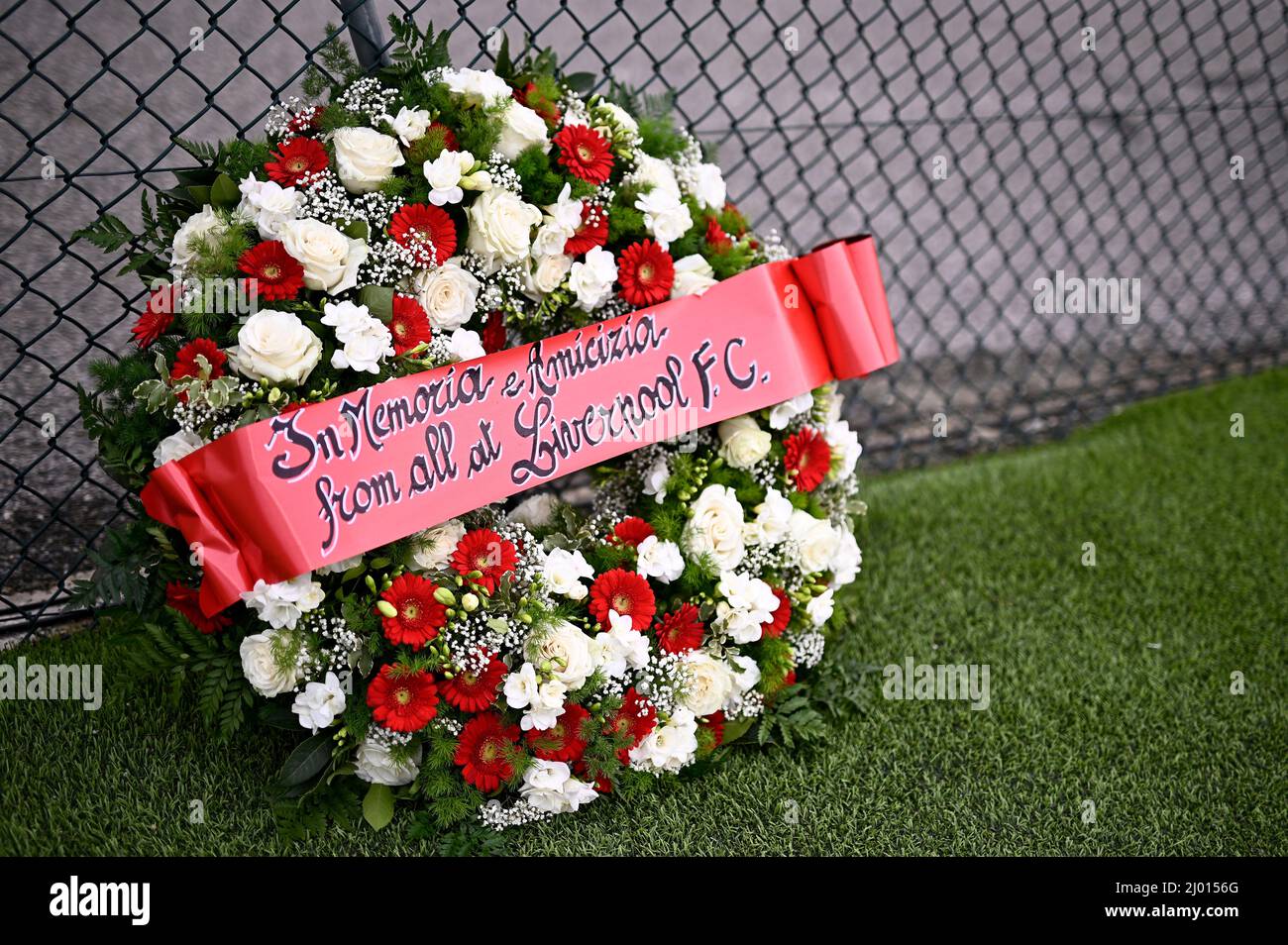 Vinovo, Italy. 15 March 2022. A flowers wreath sits pitchside left by Liverpool FC in memory of the Heysel stadium victims during the UEFA Youth League quarterfinal football match between Juventus FC U19 and Liverpool FC U19. Credit: Nicolò Campo/Alamy Live News Stock Photo