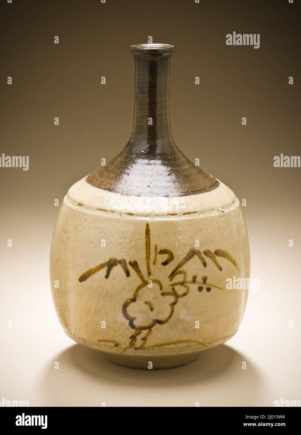 Sake Bottle with Plum Blossom and Sasa Bamboo Design. Japan, Edo period (1615-1868), 18th century. Ceramics. Hizen ware, Takeo type; stoneware with white slip, iron and clear glazes Stock Photo