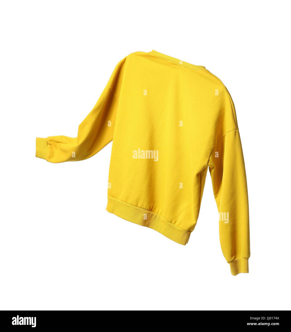 Flying yellow sweatshirt on white background Stock Photo Alamy