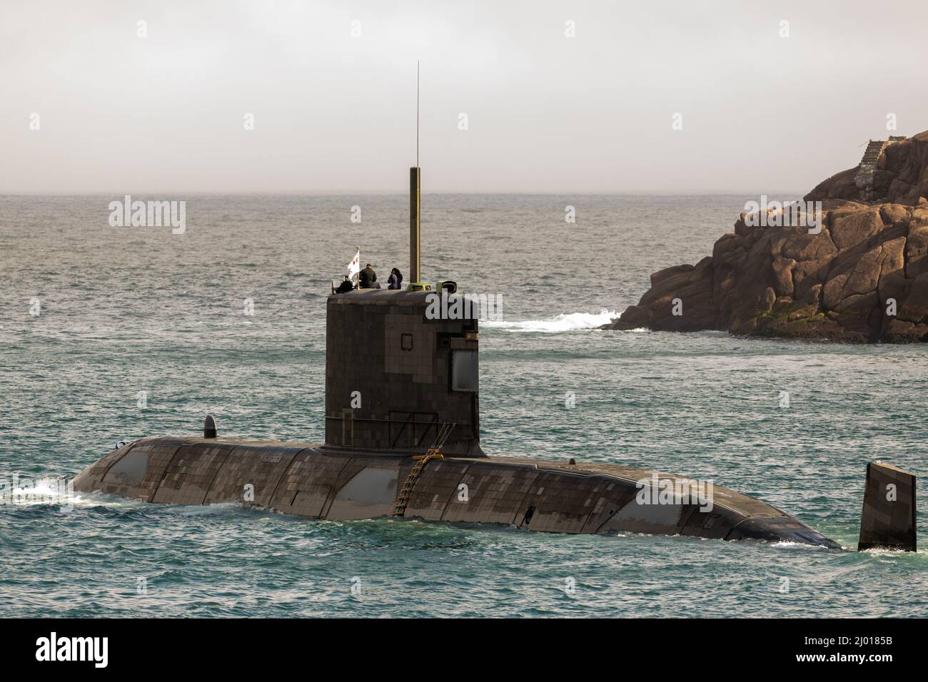 HMSC Windsor, a long-range hunter-killer Canadian Submarine. The attack-submarine vessel has a teardrop hull with a diesel-powered engine moving above Stock Photo