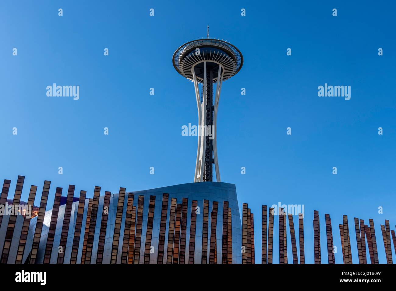 Seattle, WA USA - circa March 2022: Low angle view of the iconic Seattle Space Needle shot against a clear, bright blue sky Stock Photo
