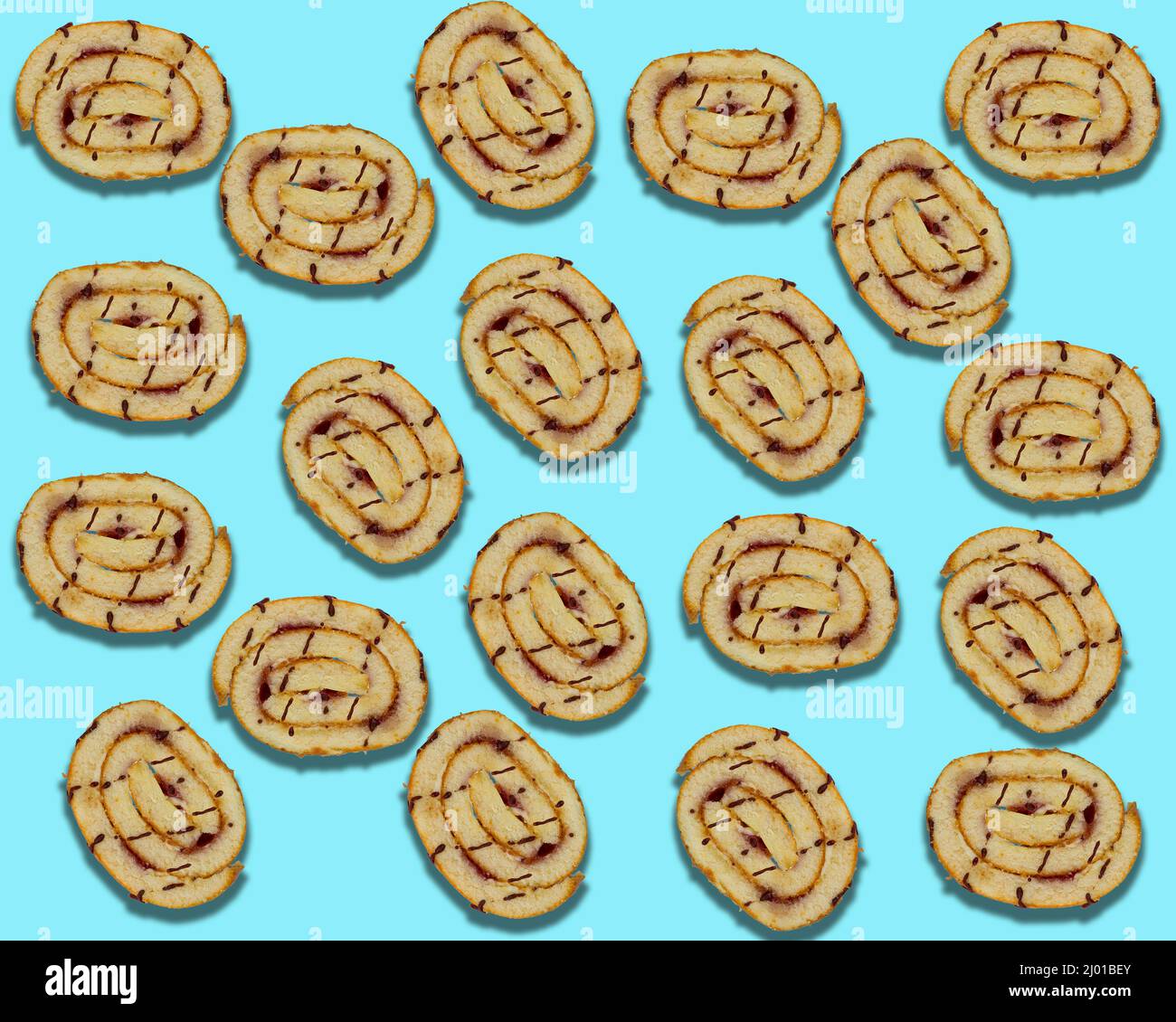 Cake slices on blue background. Pastry abstract background, Cake slices flat lay isolated. Top view Stock Photo