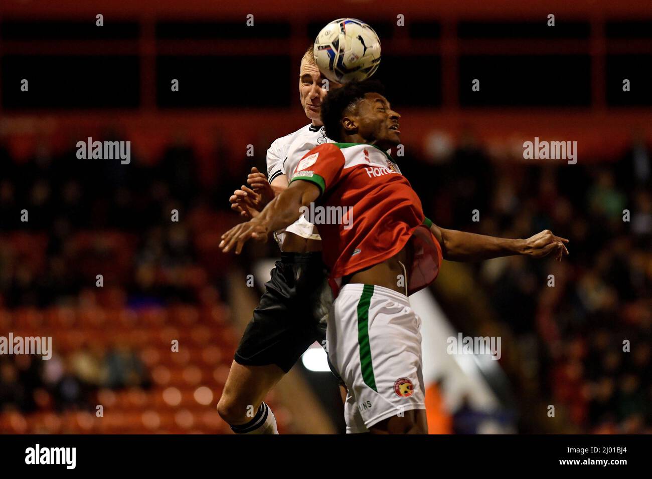 WALSALL, UK. MAR 15TH Oldham Athletic's Will Sutton tussles with Tyrese Shade of Walsall Football Club during the Sky Bet League 2 match between Walsall and Oldham Athletic at the Banks's Stadium, Walsall on Tuesday 15th March 2022. (Credit: Eddie Garvey | MI News) Credit: MI News & Sport /Alamy Live News Stock Photo