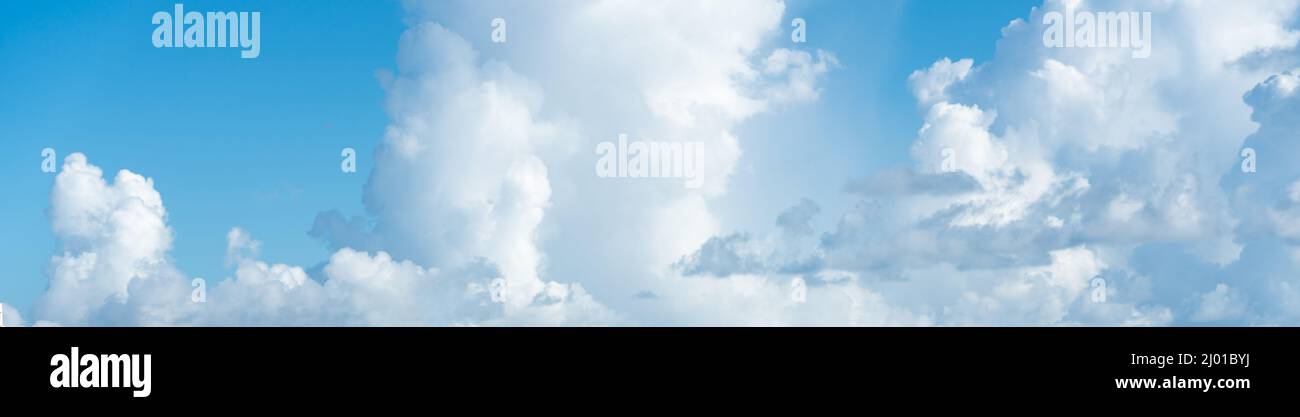 Panorama of blue sky with white clouds in clear weather Stock Photo