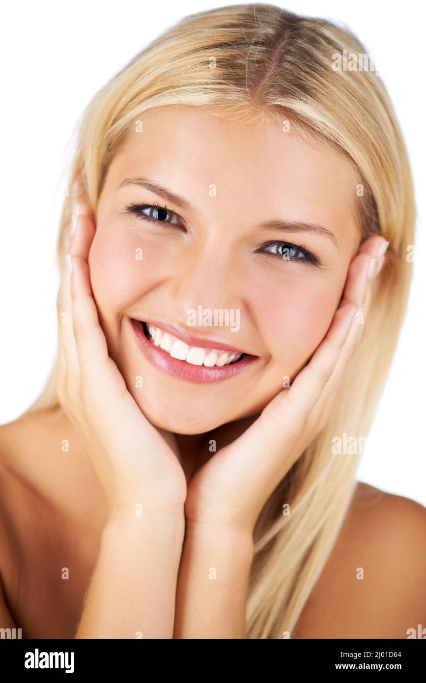 What a dazzling smile. Smiling young woman with flawless skin. Stock Photo