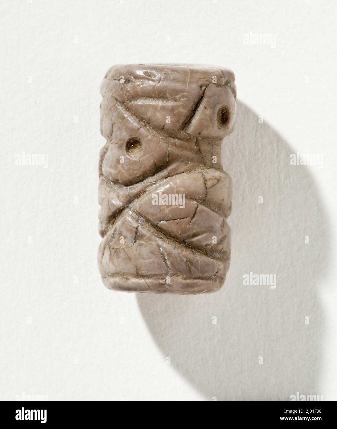 Cylinder Seal. Iran, Mesopotamia or Syria, Transitional period, about 2900-2800 B.C.. Tools and Equipment; seals. Gray marble Stock Photo