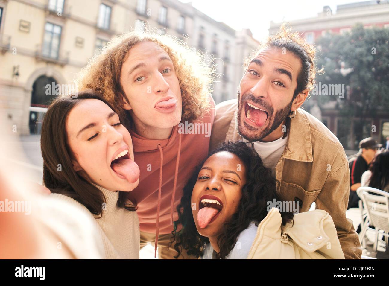 Selfie of cheerful friends goofing off. Happy people taking photo self portrait. Stock Photo