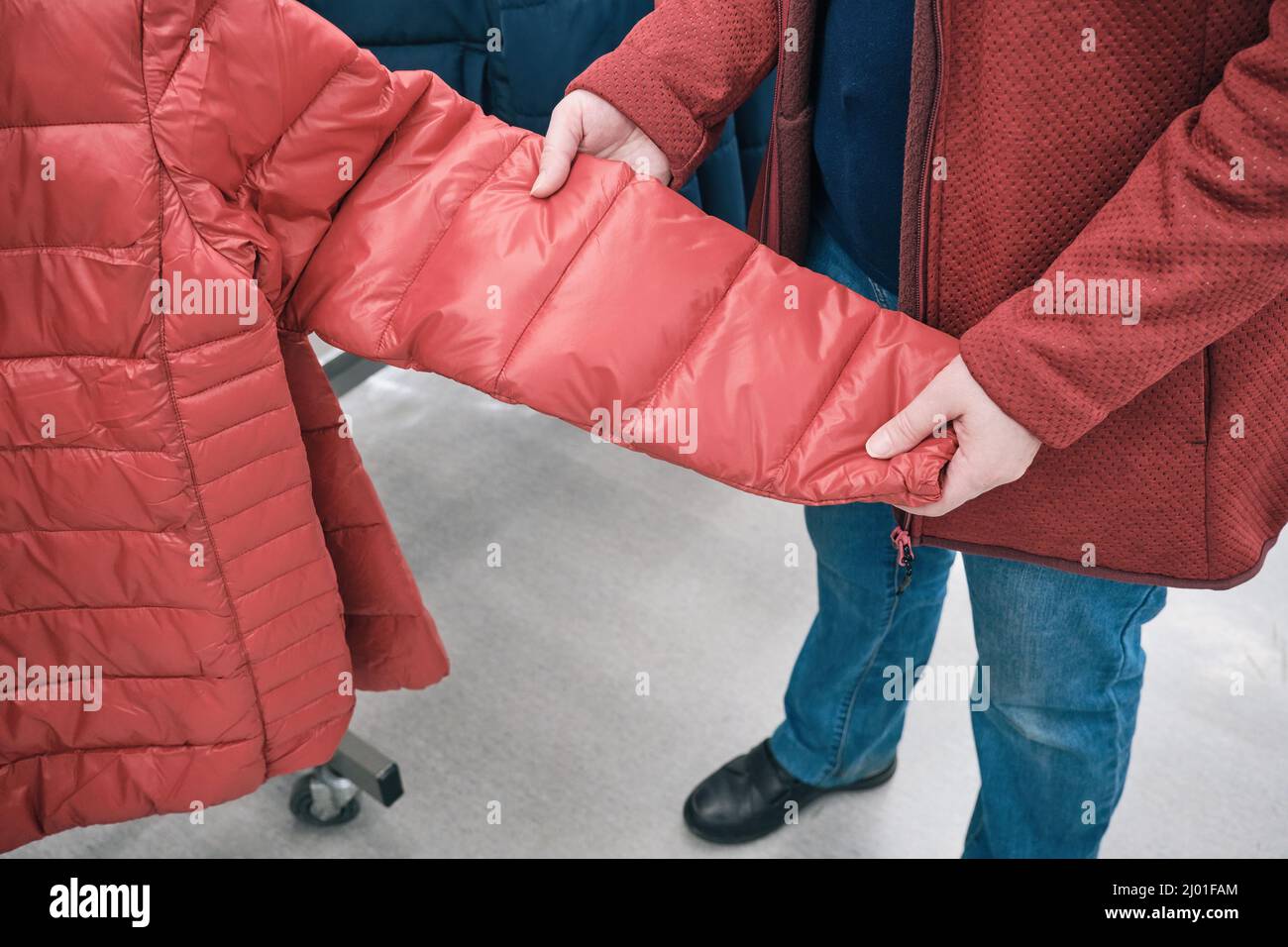 Lady in red jacket hi-res stock photography and images - Alamy