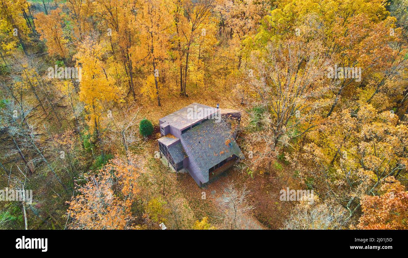 Aerial of home in the fall forest Stock Photo - Alamy