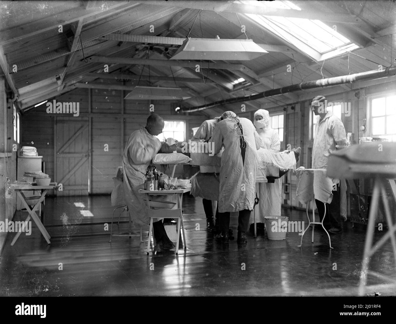 An operation being conducted in the theatre of the New Zealand Stationary Hospital, Wisques, France. Stock Photo