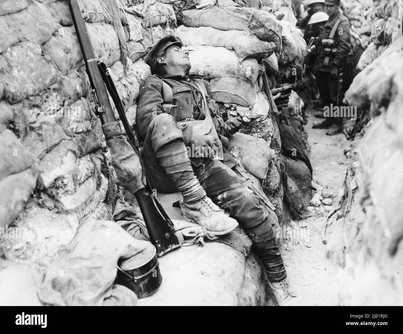 A soldier fast asleep in a trench at Thiepval during WW1 Stock Photo