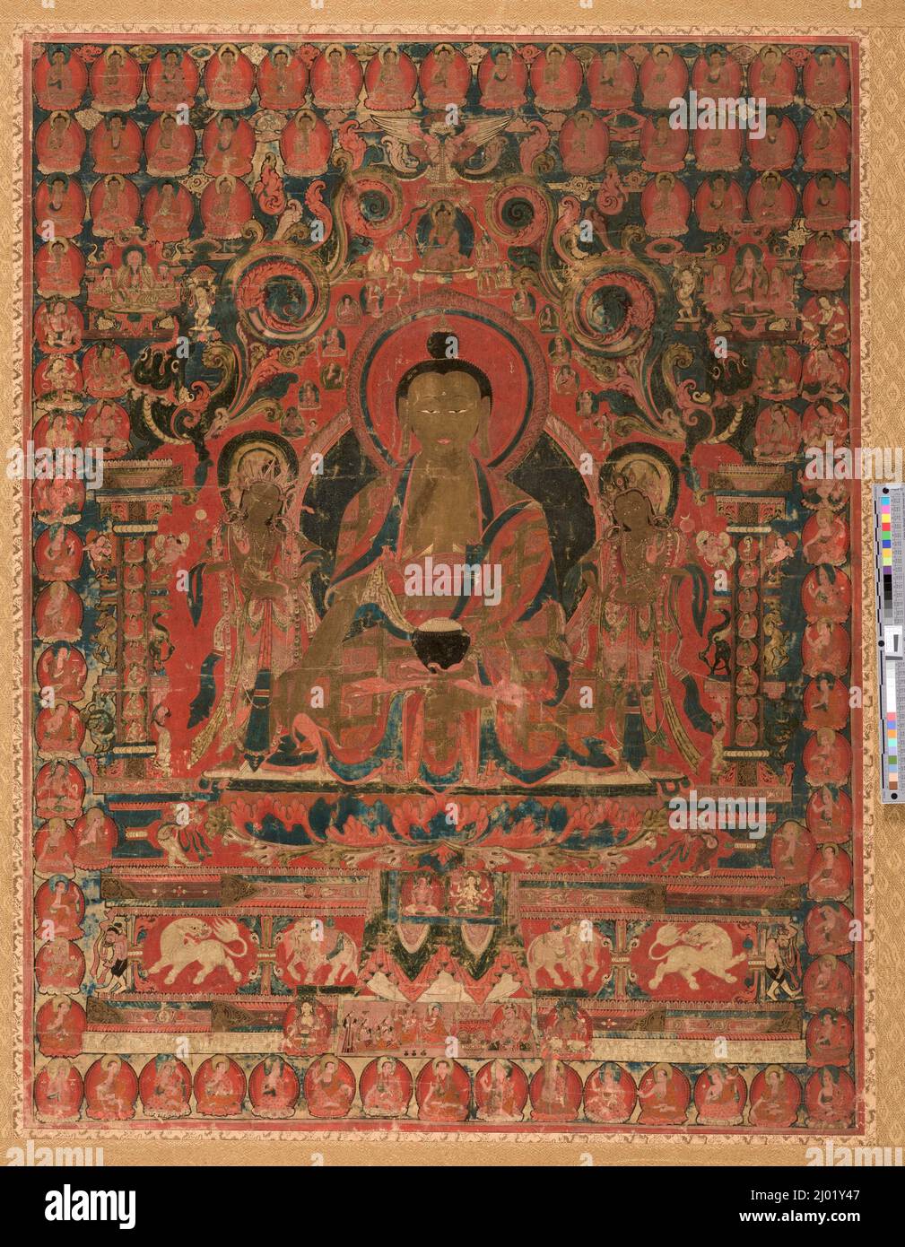 The Supreme Physician (Bhaishajyaguru) and His Celestial Assembly. Western Tibet, Guge, 15th century. Paintings. Mineral pigments on cotton cloth Stock Photo