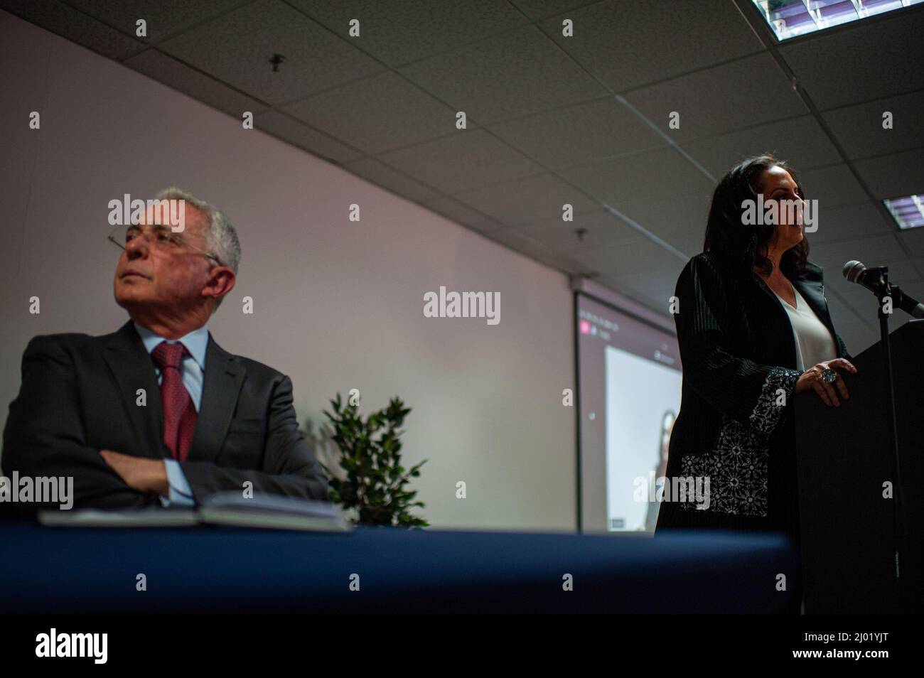 Former president of Colombia, Alvaro Uribe Velez (2002-2010) (Left) listens to senator Maria Fernanda Cabal during the Centro Democratico political party meeting to choose a path for the 2022 presidential elections in Colombia, after the prelimiary elections, in Bogota, Colombia, March 15, 2022. Photo by: Long Visual Press Stock Photo
