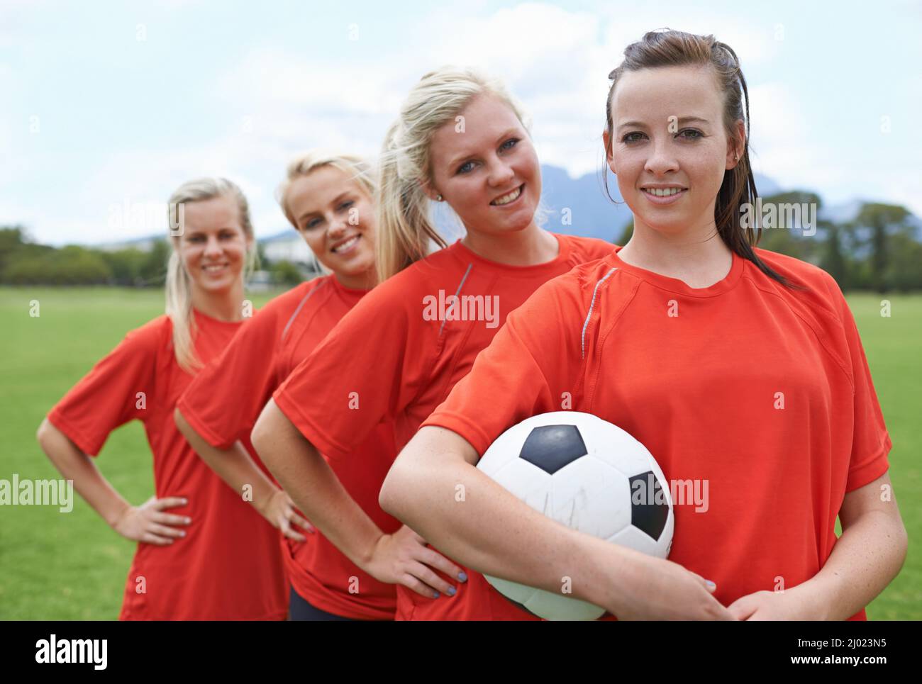 Together theyll win. Portrait of a young female soccer player and her