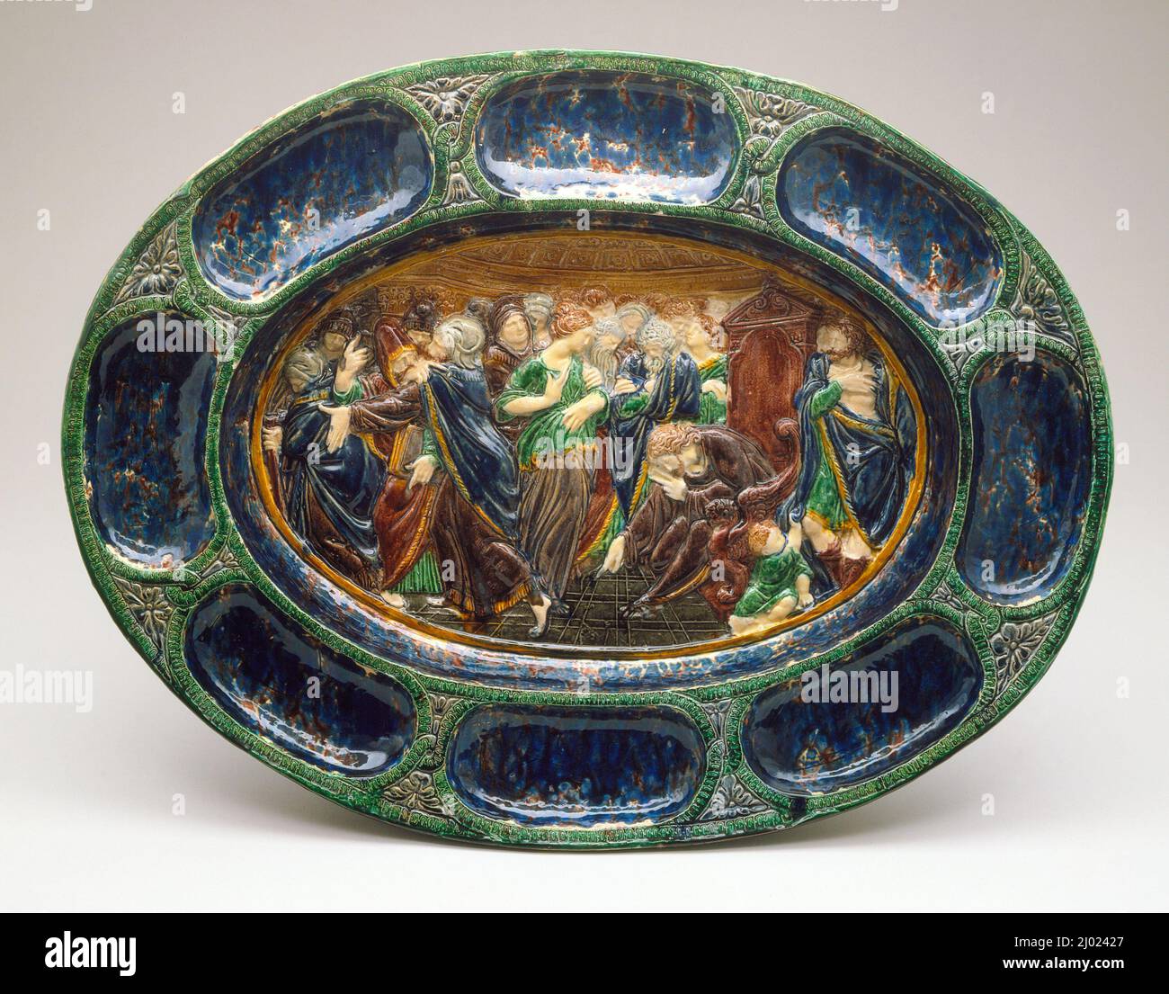 Large Oval Dish with Scene of Christ and the Woman Taken in Adultery. Palissy (after), Bernard (France, 1509–1590). France, circa 1560-1600. Furnishings; Serviceware. Lead-glazed earthenware, Palissy ware Stock Photo