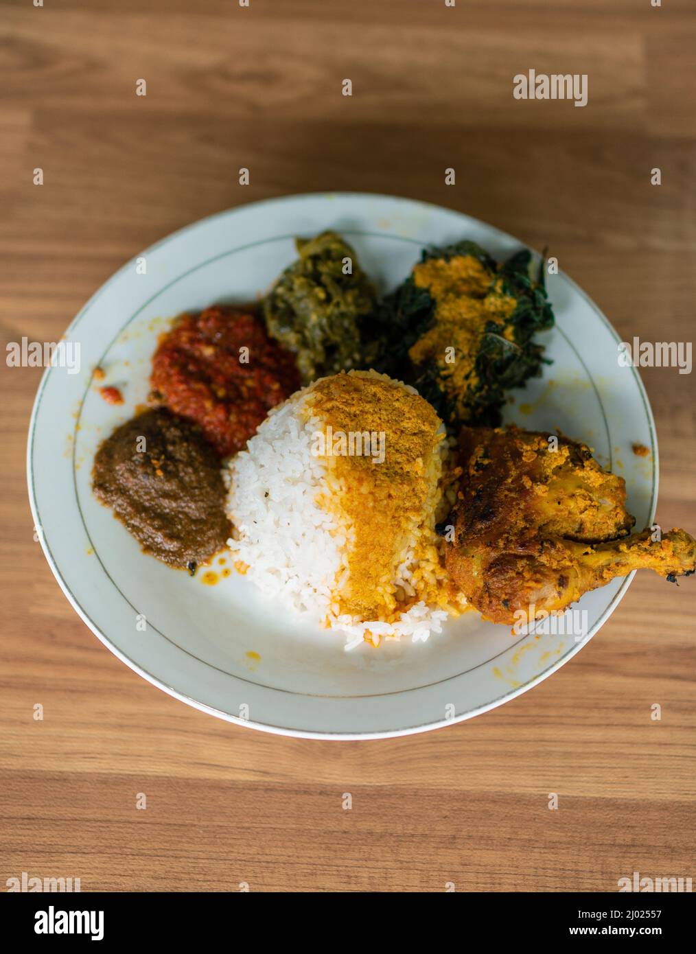 indonesian traditional food with rendang and fried chiken Stock Photo