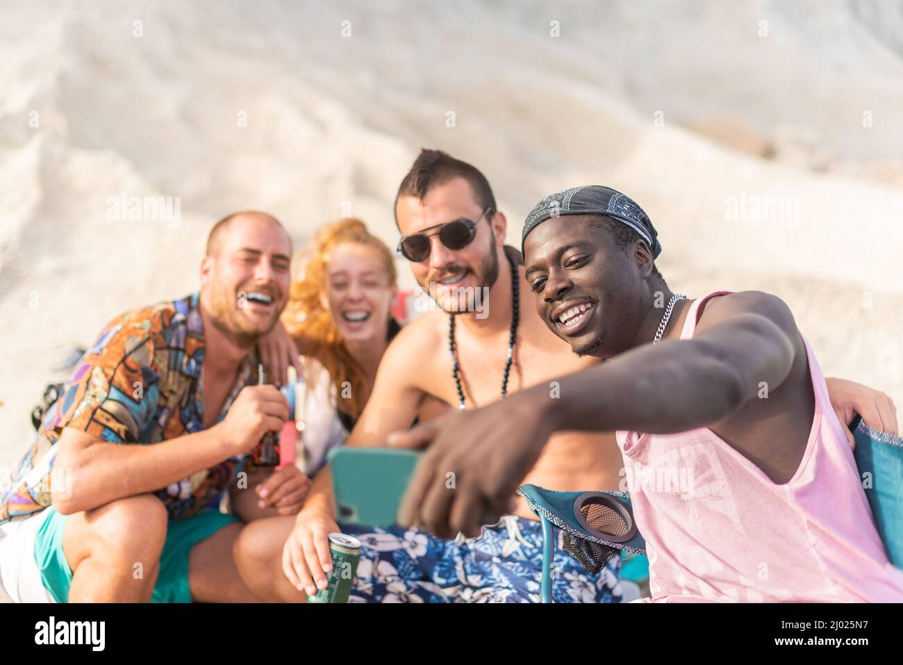 four friends having fun and posing for a selfie Stock Photo