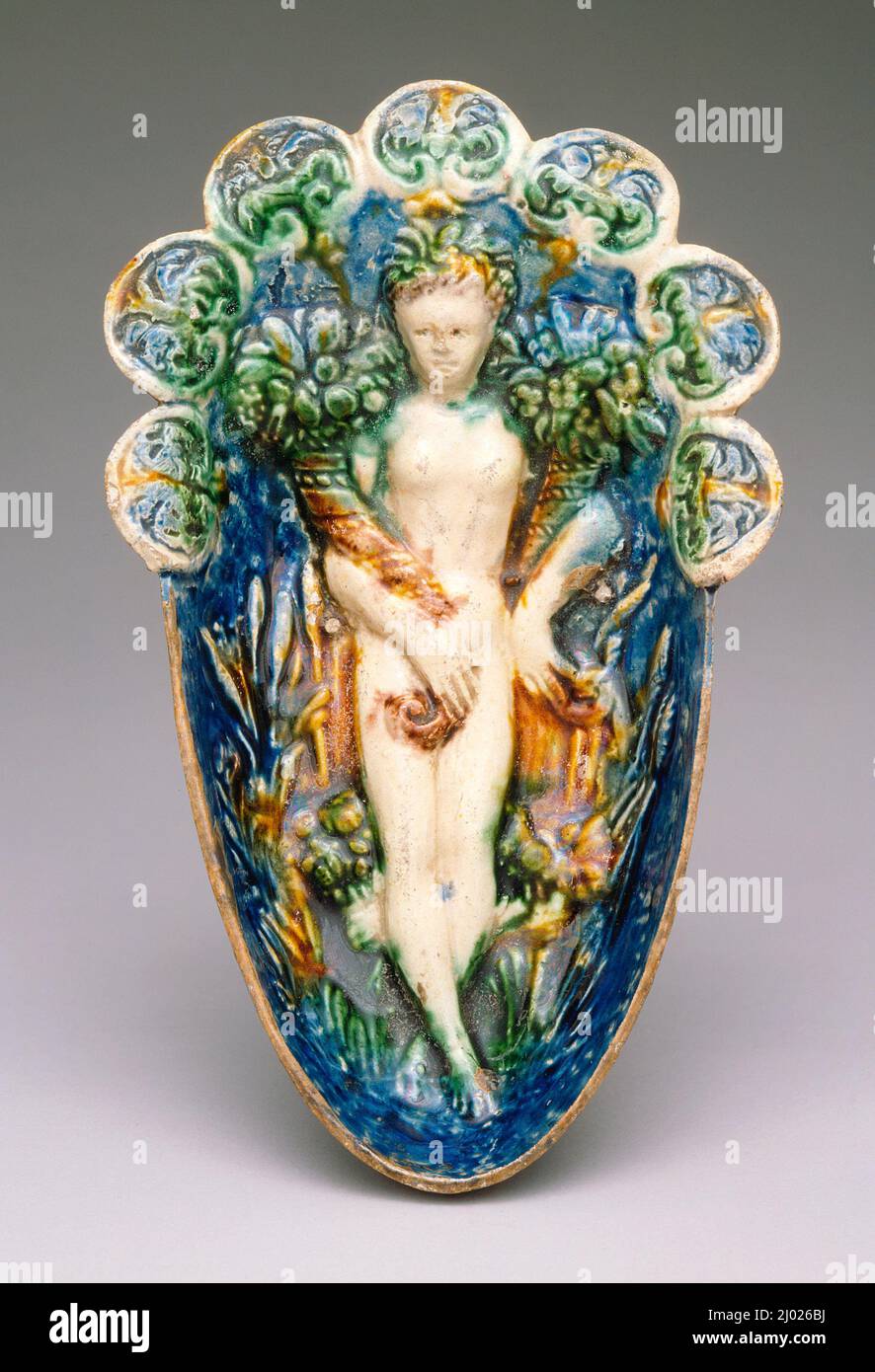 Boat-Shaped Bowl with a Figure of Pomona. Palissy (after), Bernard (France, 1509–1590). France, 1560-1600. Furnishings; Serviceware. Lead-glazed earthenware, Palissy ware Stock Photo