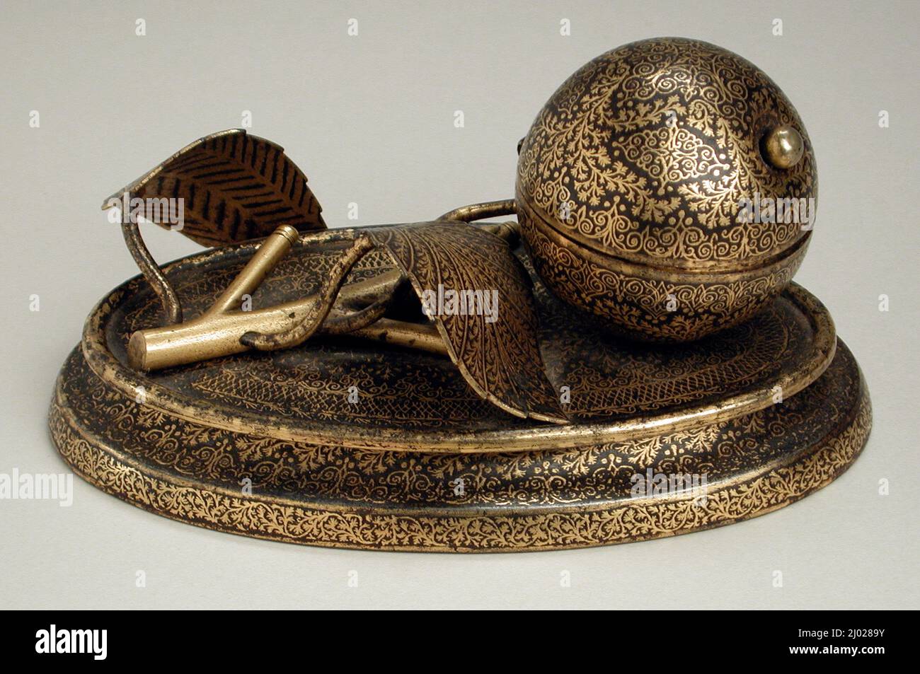 Inkstand. Pakistan, Panjab, Sialkot or Gujrat, Kotli Loharan, circa 1850-1870. Tools and Equipment; stands. Iron overlaid with gold wire Stock Photo