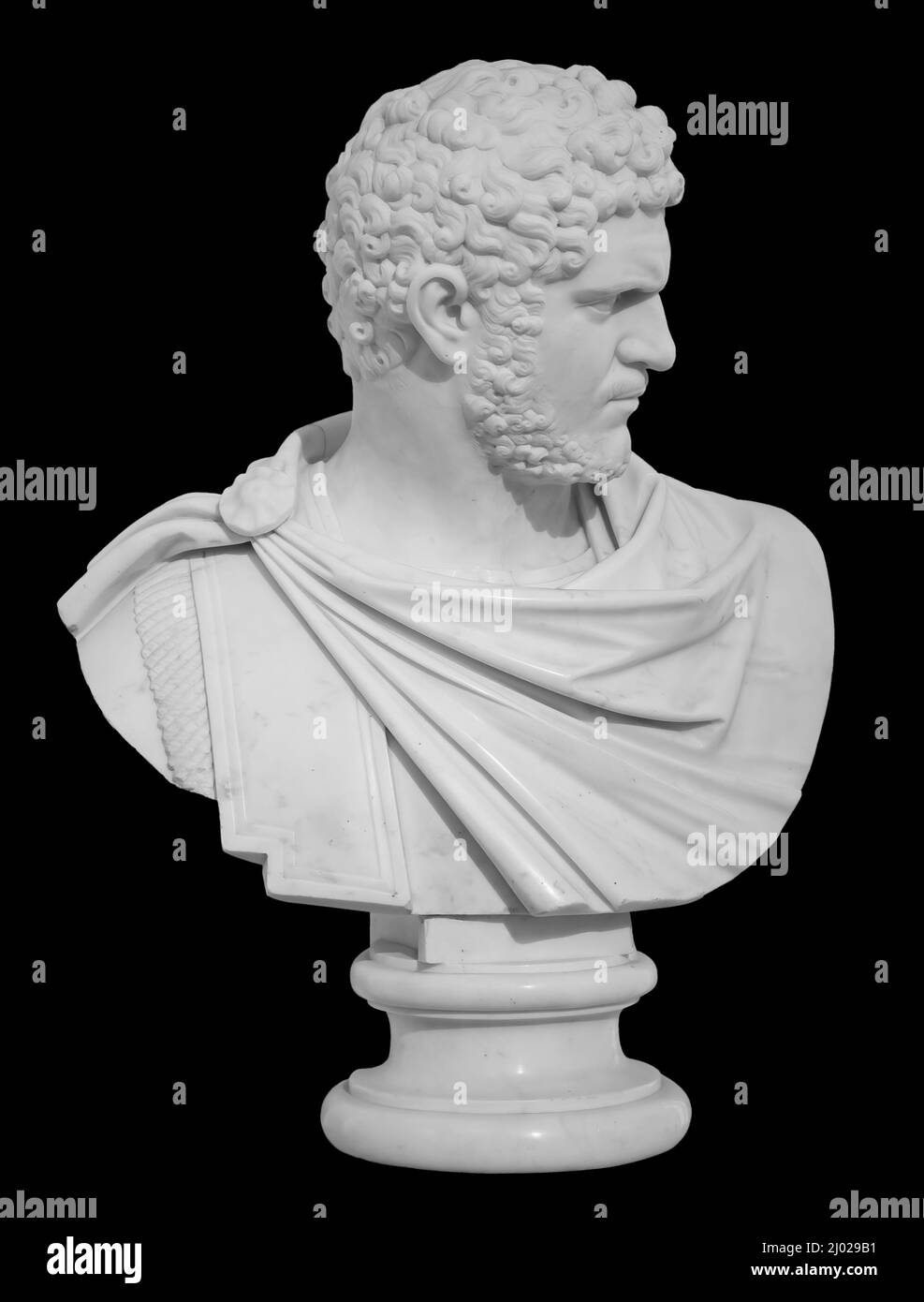 Ancient white marble sculpture bust of Caracalla. Marcus Aurelius Severus Antoninus Augustus known as Antoninus. Roman emperor. Isolated on a black Stock Photo