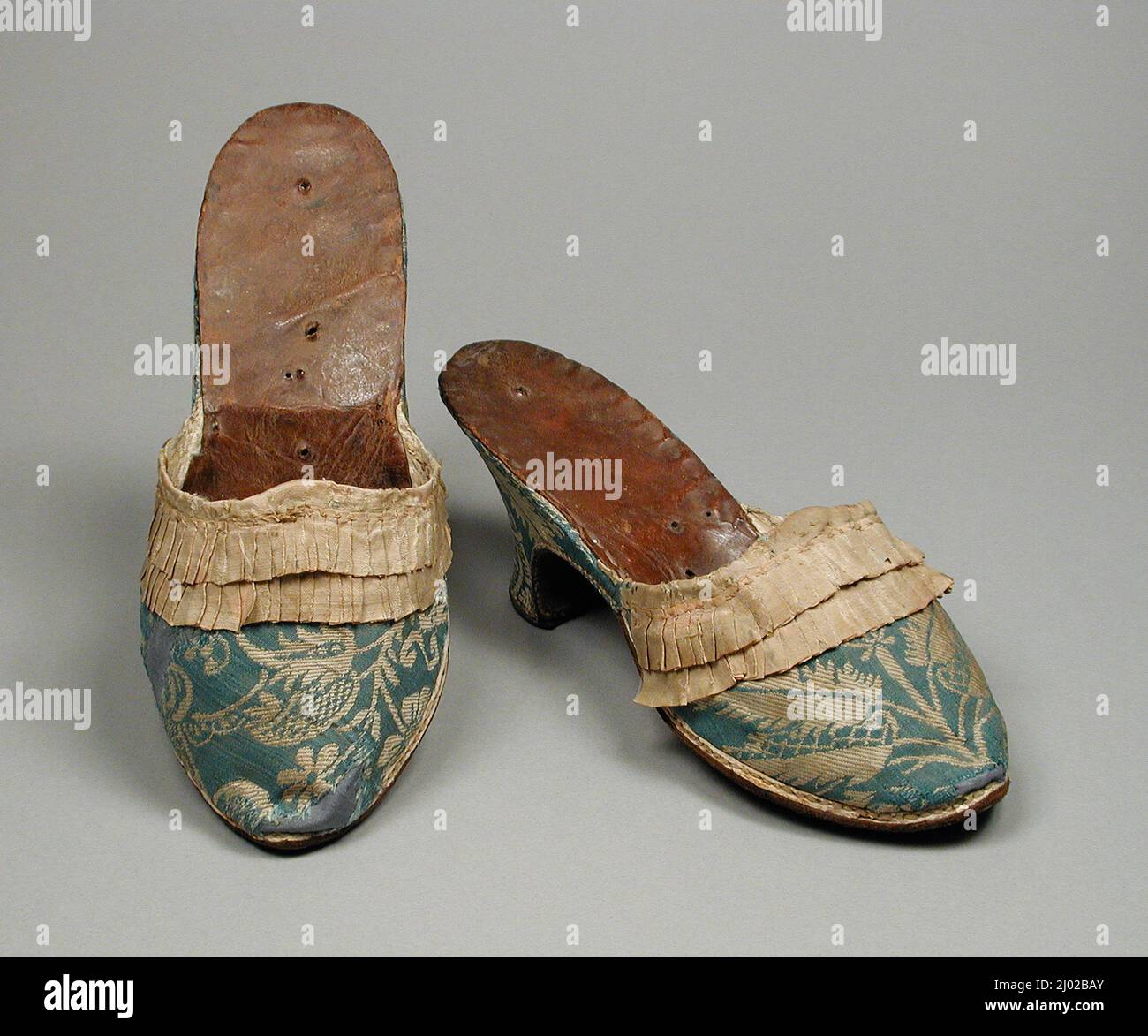 Woman's Shoes (Mules). Germany or Italy, 1770-1780. Costumes; Accessories.  Silk plain weave with silk supplementary weft-float patterning, silk  plain-weave trim, and leather Stock Photo - Alamy