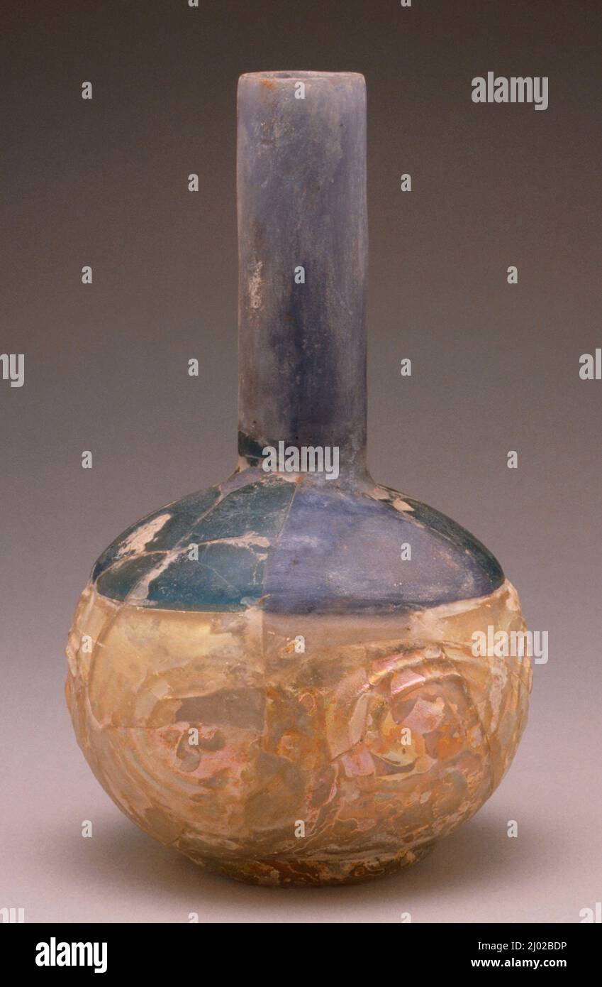 Bottle. Eastern Mediterranean, 9th-10th century. Glass. Glass, free-blown in two parts, impressed decoration Stock Photo