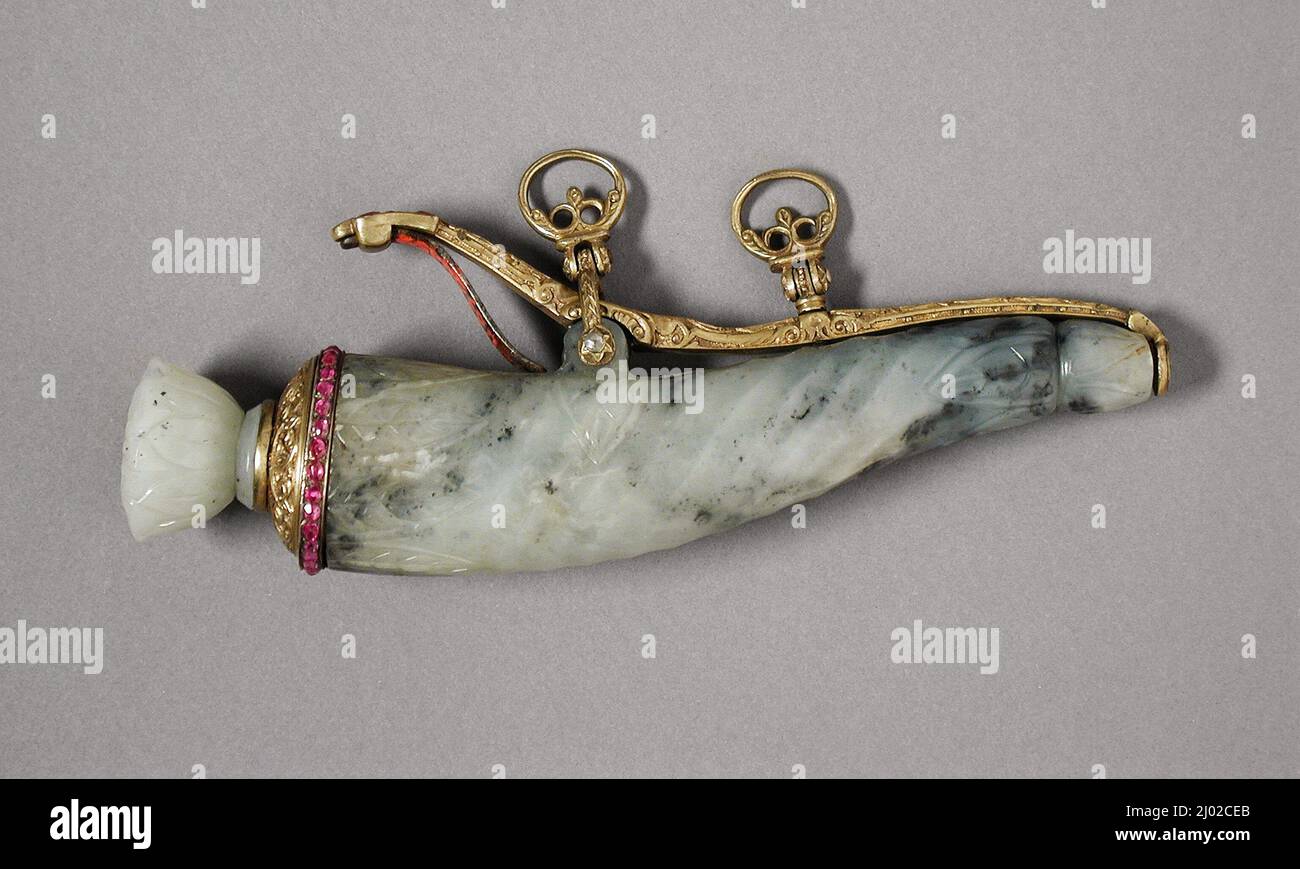 Powder Primer Flask (baruddan). India, Mughal empire, circa 1700-25. Arms and Armor; powder primer flasks. Mottled gray nephrite jade inlaid with spinels and clear gemstones set in gold, gilt copper alloy fittings Stock Photo