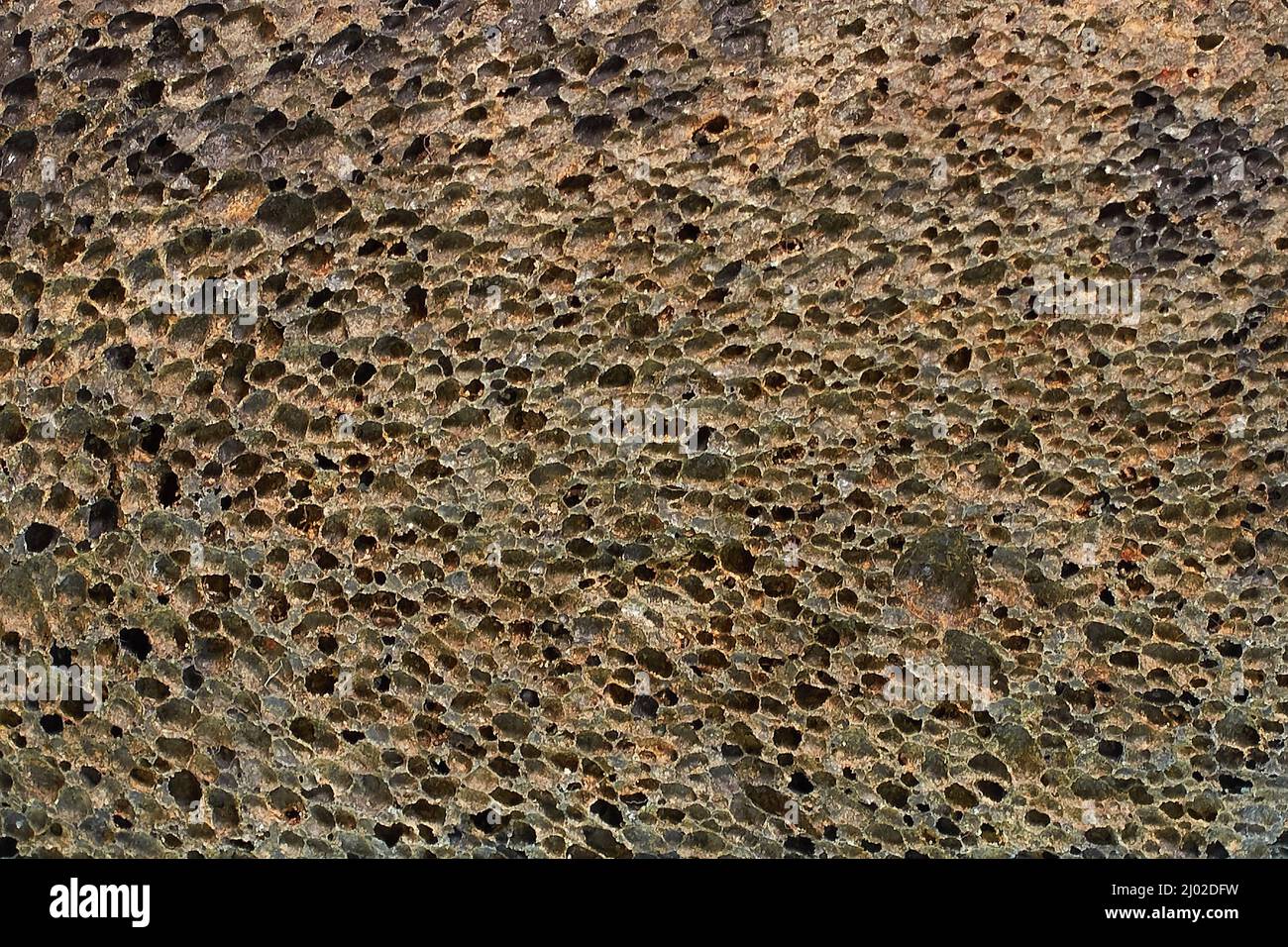 Black pumice stone texture for foot care, horizontal format Stock Photo