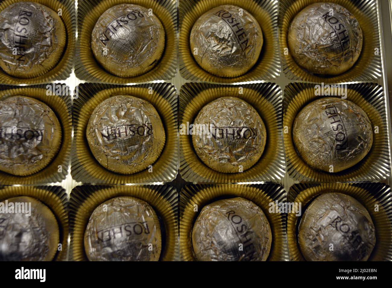Sweet chocolates of the Ukrainian factory, wrapped in a gold label ...