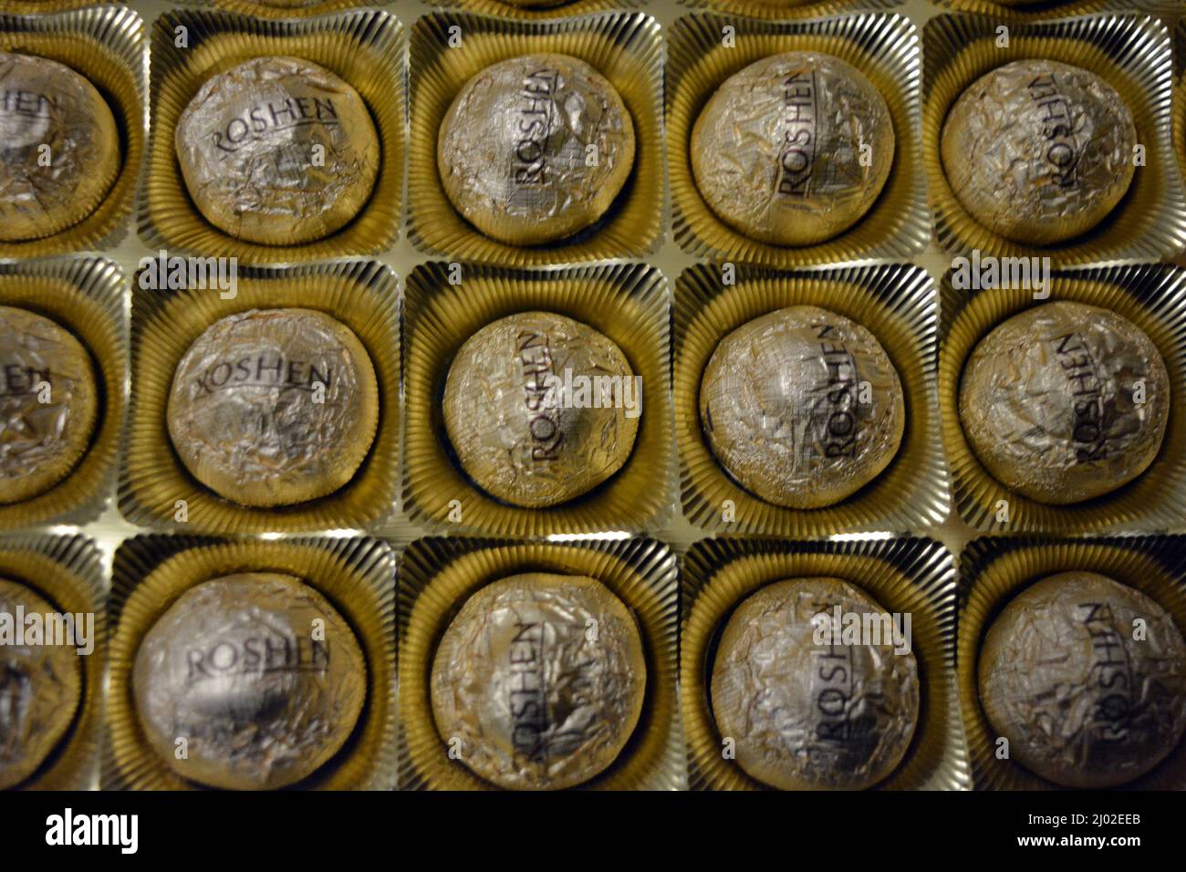 Sweet chocolates of the Ukrainian factory, wrapped in a gold label ...
