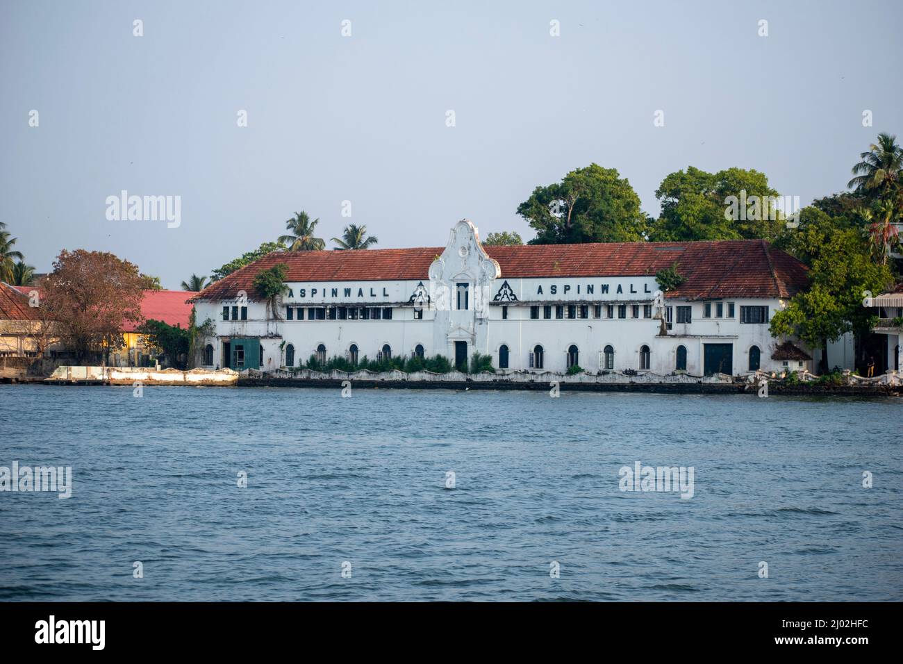 A picture of a colonial building in India Aspinwall House is a large sea facing heritage property in Fort Kochi. Picture is taken from Kochi, Kerala, Stock Photo