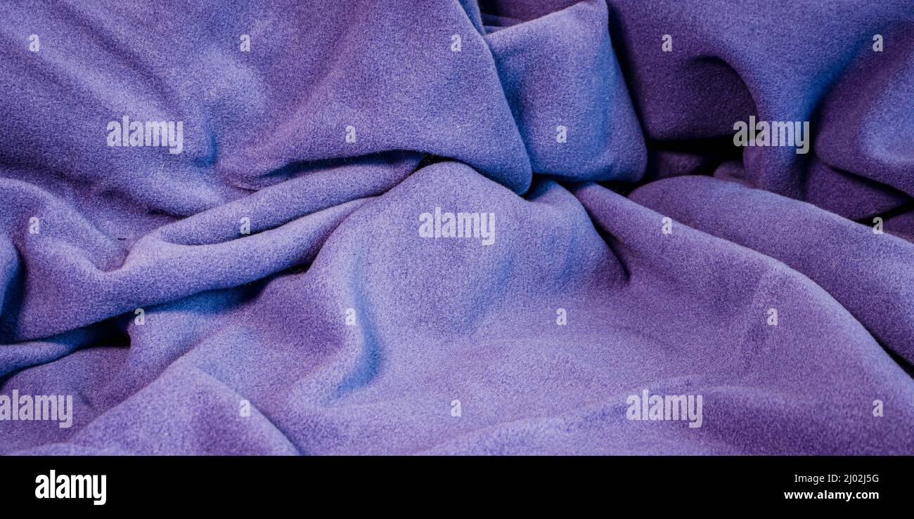 Woolen textile texture, crumpled drape, background for design Stock Photo