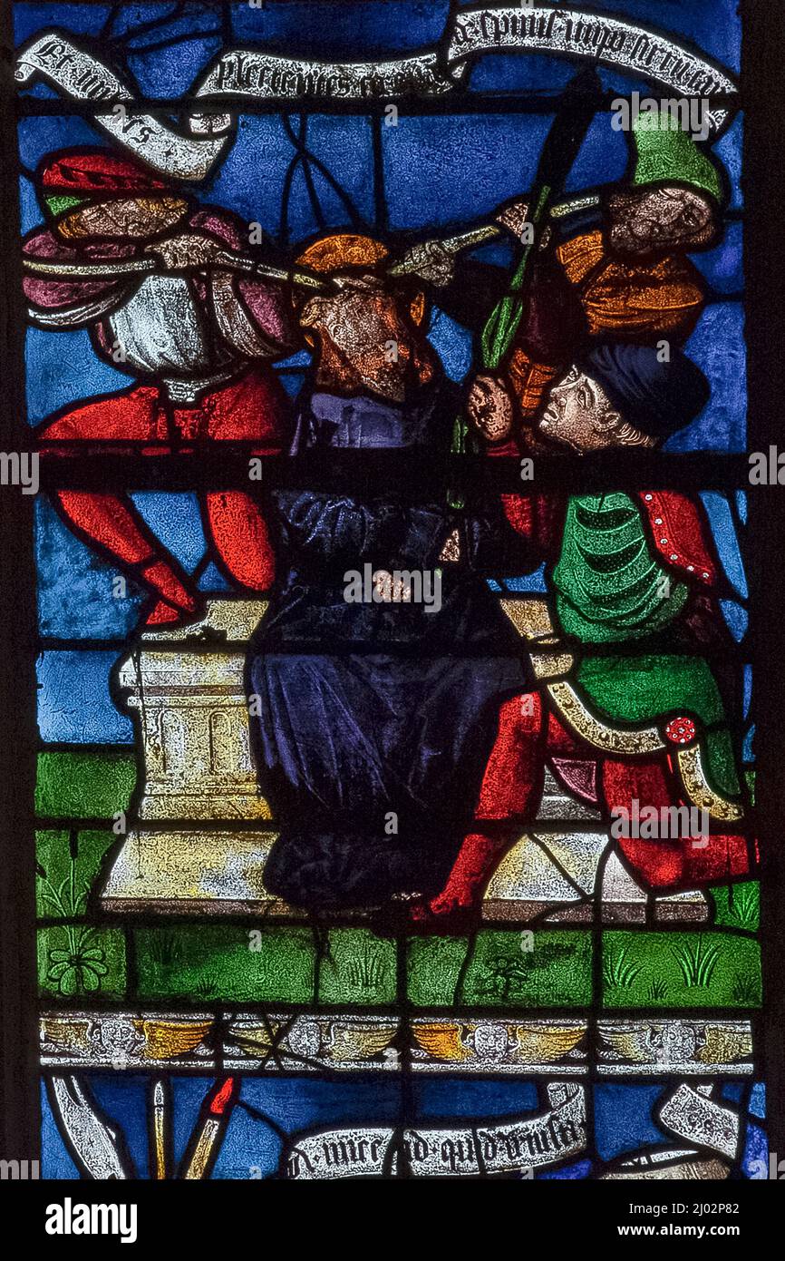 The Crowning with Thorns: vivid French stained glass depicting a scene from the Passion of Christ in a window of 1511, created by the master glassmakers of Troyes, in the Église Saint-Rémi at Ceffonds, a village in the Haute-Marne department of the Champagne region in northeast France. Stock Photo