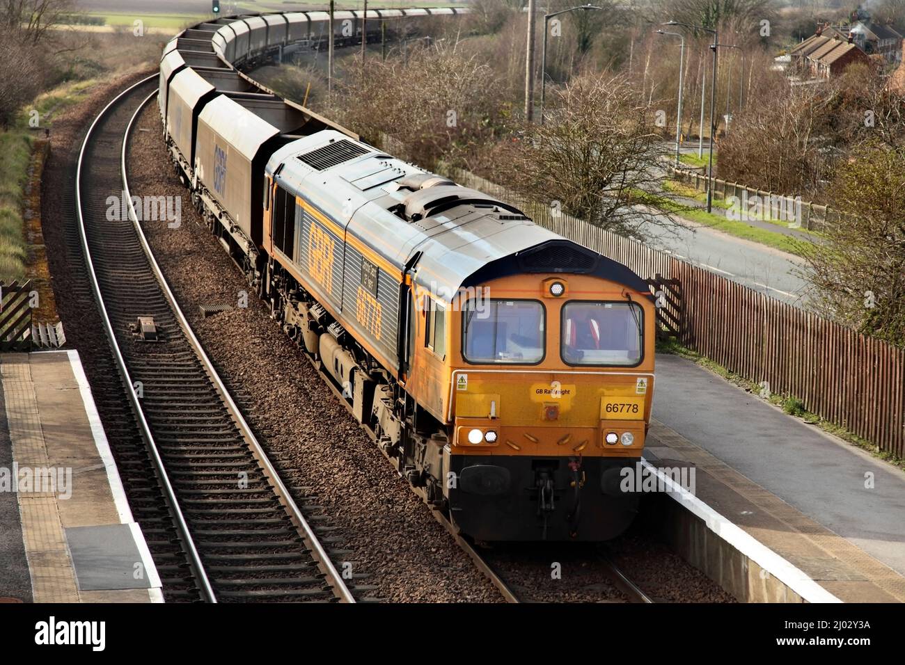 GB Railfreight Class 66 loco 66778 hauls the 1103 Ratcliffe Power Station to Immingham service through Althorpe station on 15/3/22. Stock Photo