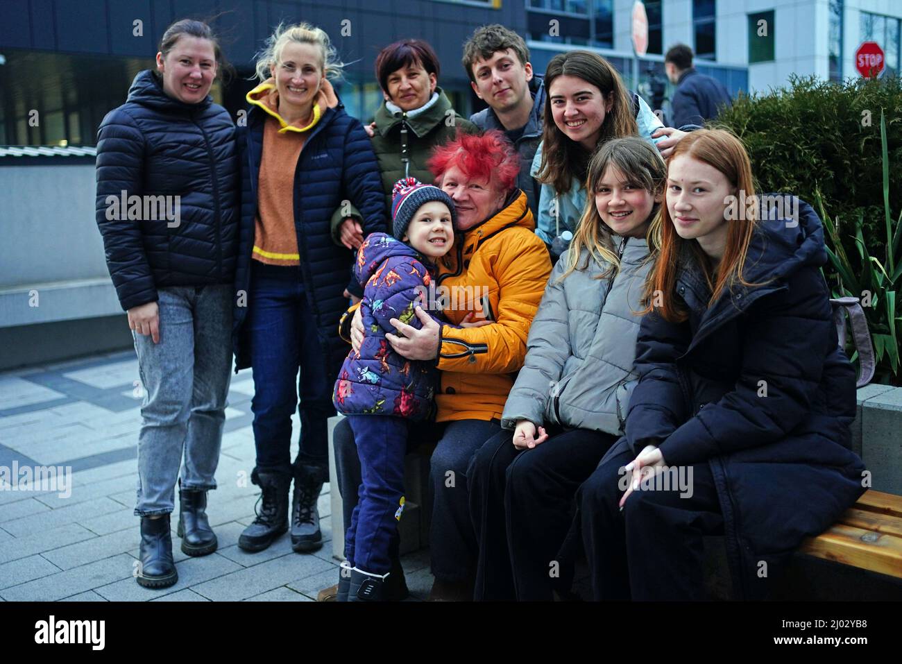 Callum Clarke (back row, second right), 27, and his wife Vitalina (back row, right), 23, from Reading in Berkshire, are reunited with her family in Rzeszow, Poland. Mr Clarke has described the Government???s Ukraine family visa application process as 'a shambles' after spending the past fortnight trying to get his wife's family to the UK. They first applied for UK visas for six members of Mrs Clarke's family as they fled Cherkasy, on the banks of the Dnieper river in central Ukraine, but they were 'pushed to the back of the queue' when the visa centre in Rzeszow, southern Poland, changed from  Stock Photo