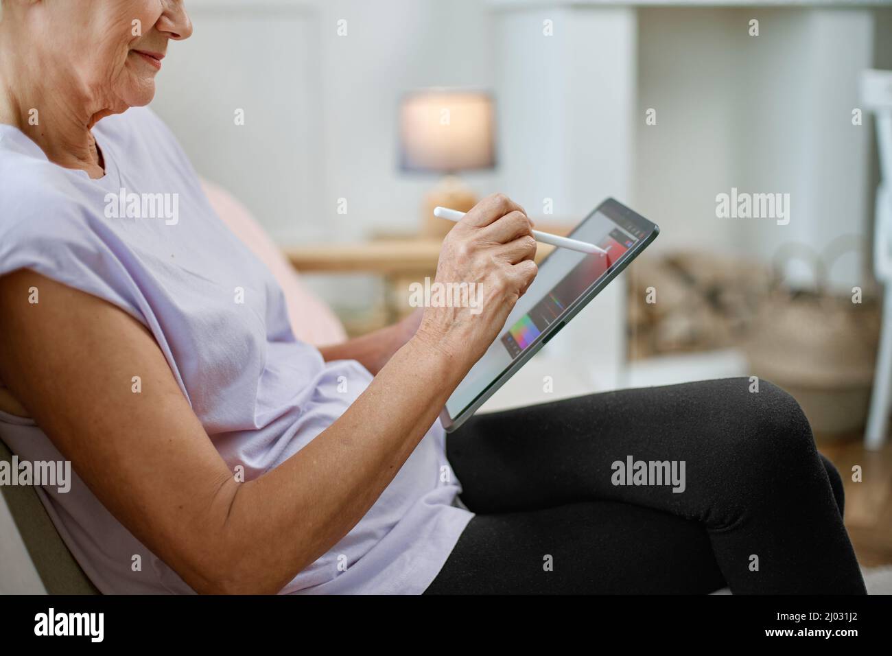 female designer with a tablet working on a new project. Stock Photo