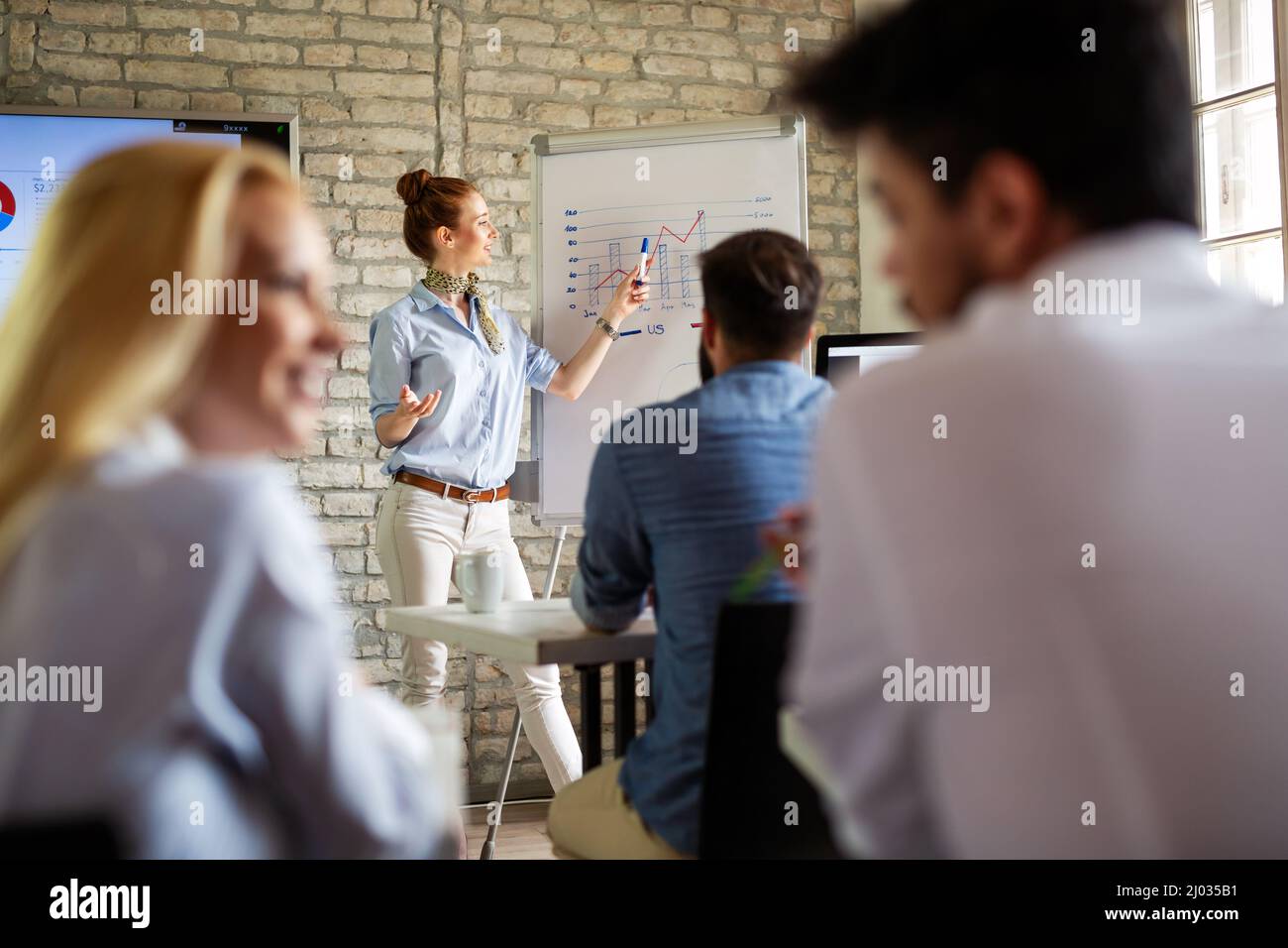 Working on new project together. Group of happy business people ...