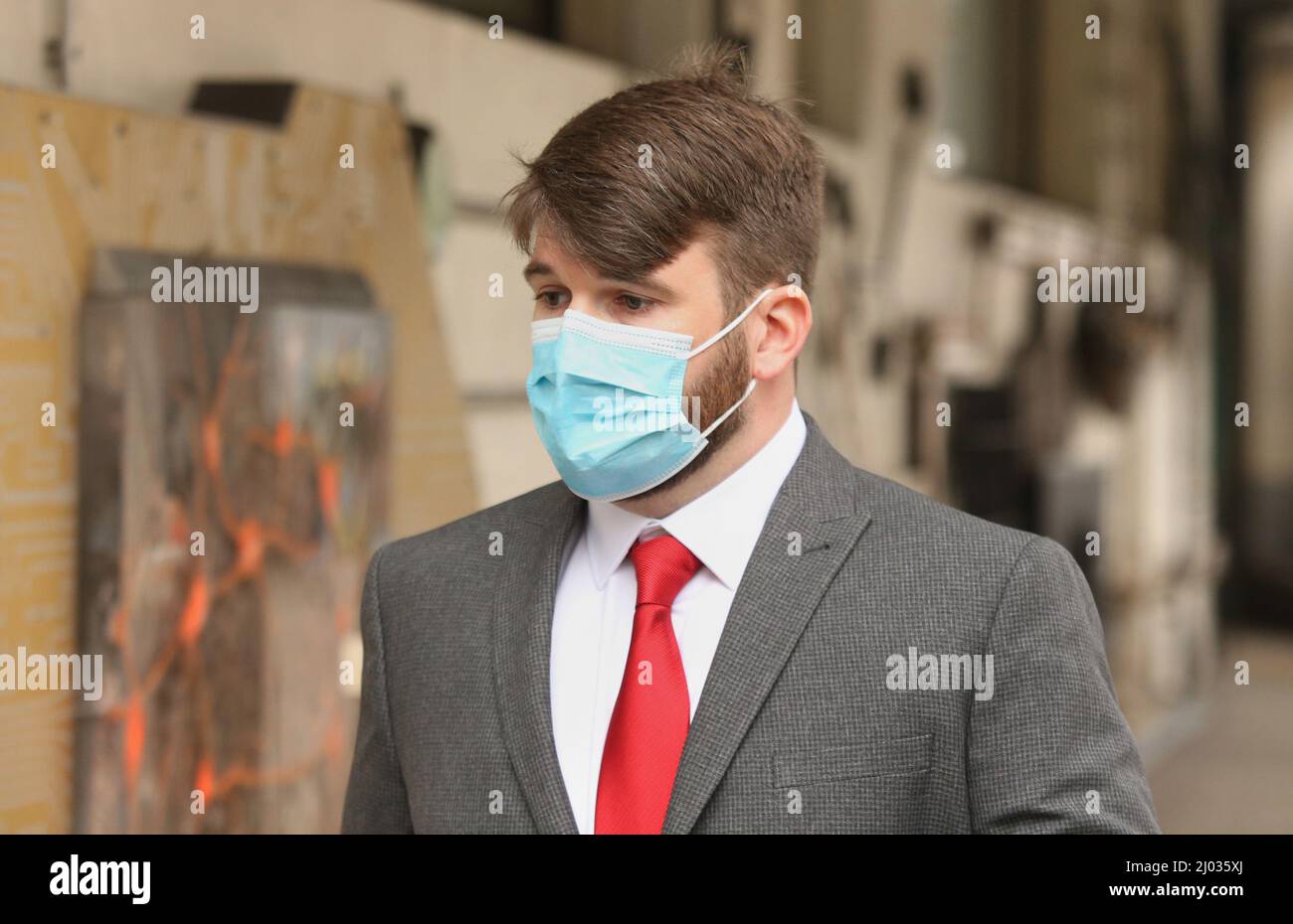 Serving Metropolitan police officer Pc William Neville, 33, arrives at Westminster Magistrates' Court where he is charged with sharing "grossly offensive" WhatsApp messages with Sarah Everard murderer Wayne Couzens. Picture date: Wednesday March 16, 2022. Stock Photo