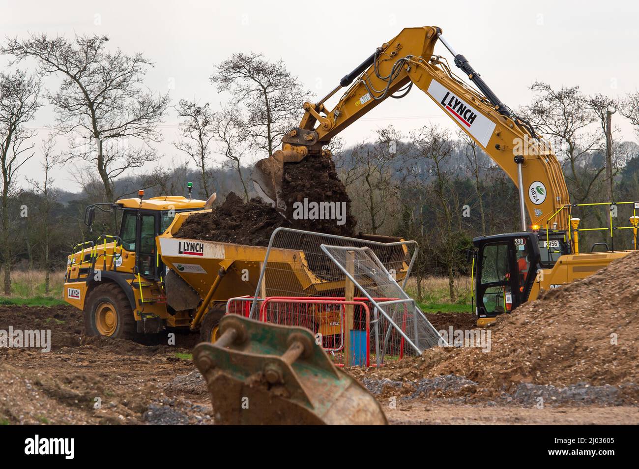 Wendover, Buckinghamshire, UK. 15th March, 2022. Construction work by HS2 at one of their compounds off the A413 on the outskirts of Wendover at the former Road Barn Farm site. The High Speed Rail construction work is having a hugely detrimental impact upon the local area as farmland has been destroyed by HS2 at their construction sites. Credit: Maureen McLean/Alamy Live News Stock Photo