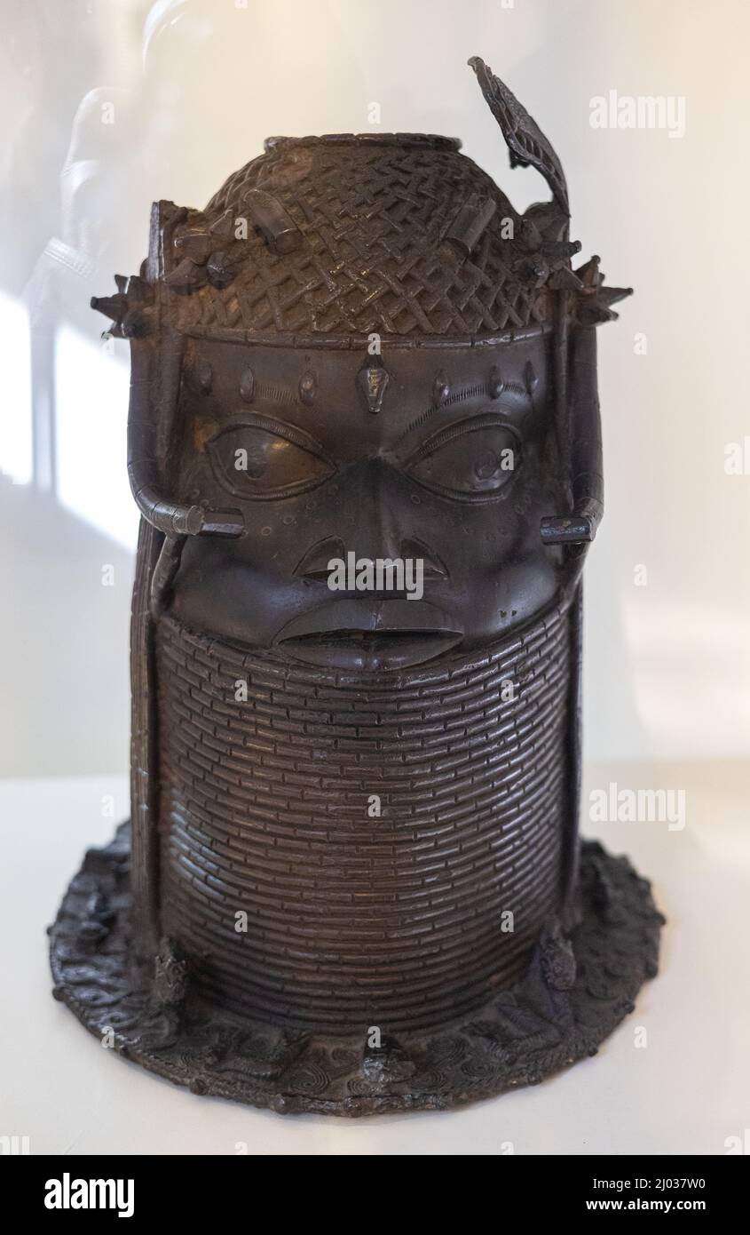 Benin Bronze UK; Commemorative head of a Queen Mother or Iyoba, one of the stolen Benin Bronzes; Museum of Archaeology and Anthropology Cambridge UK Stock Photo